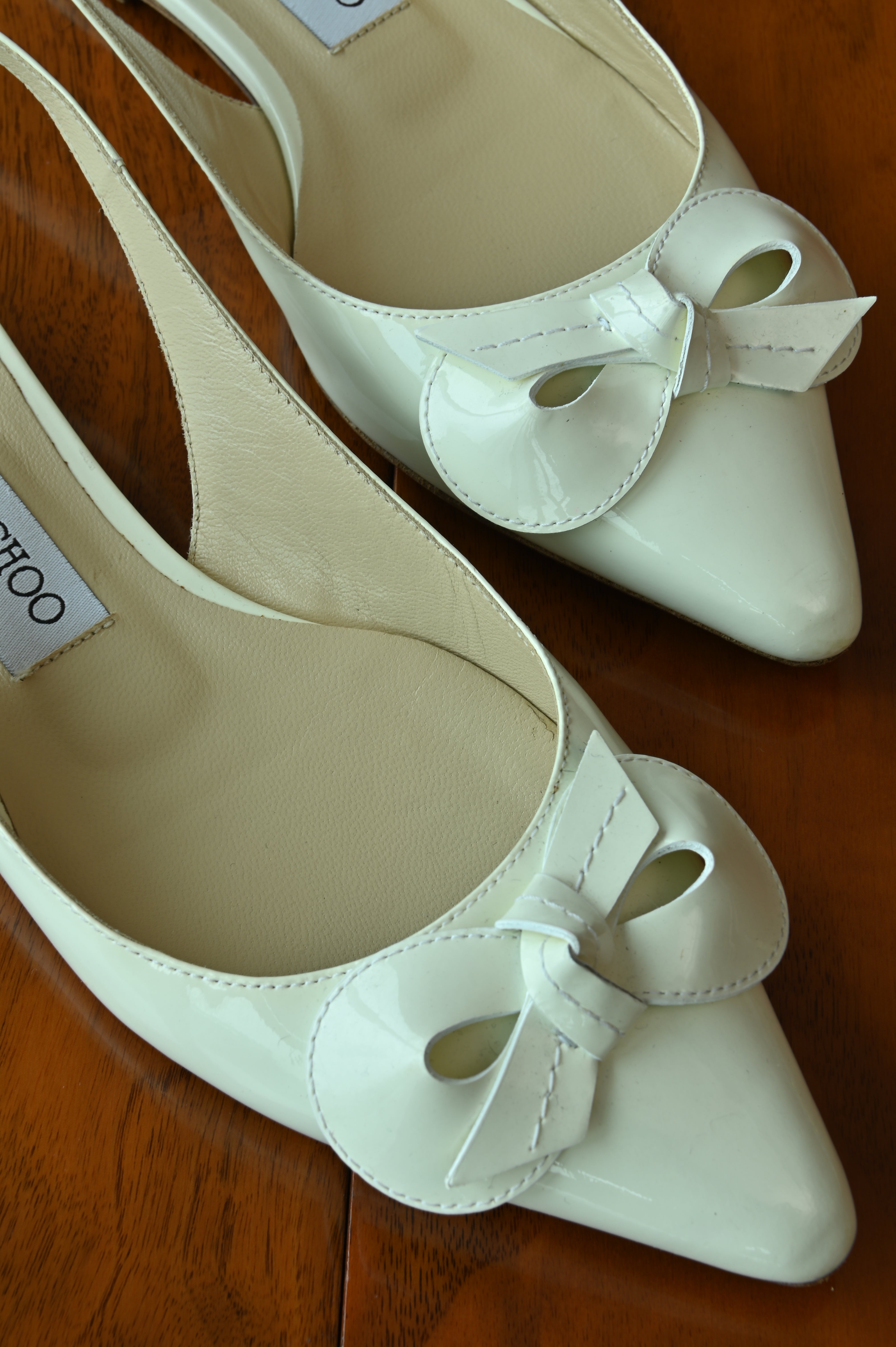 Jimmy Choo White Patent Bow Slingback Flats front