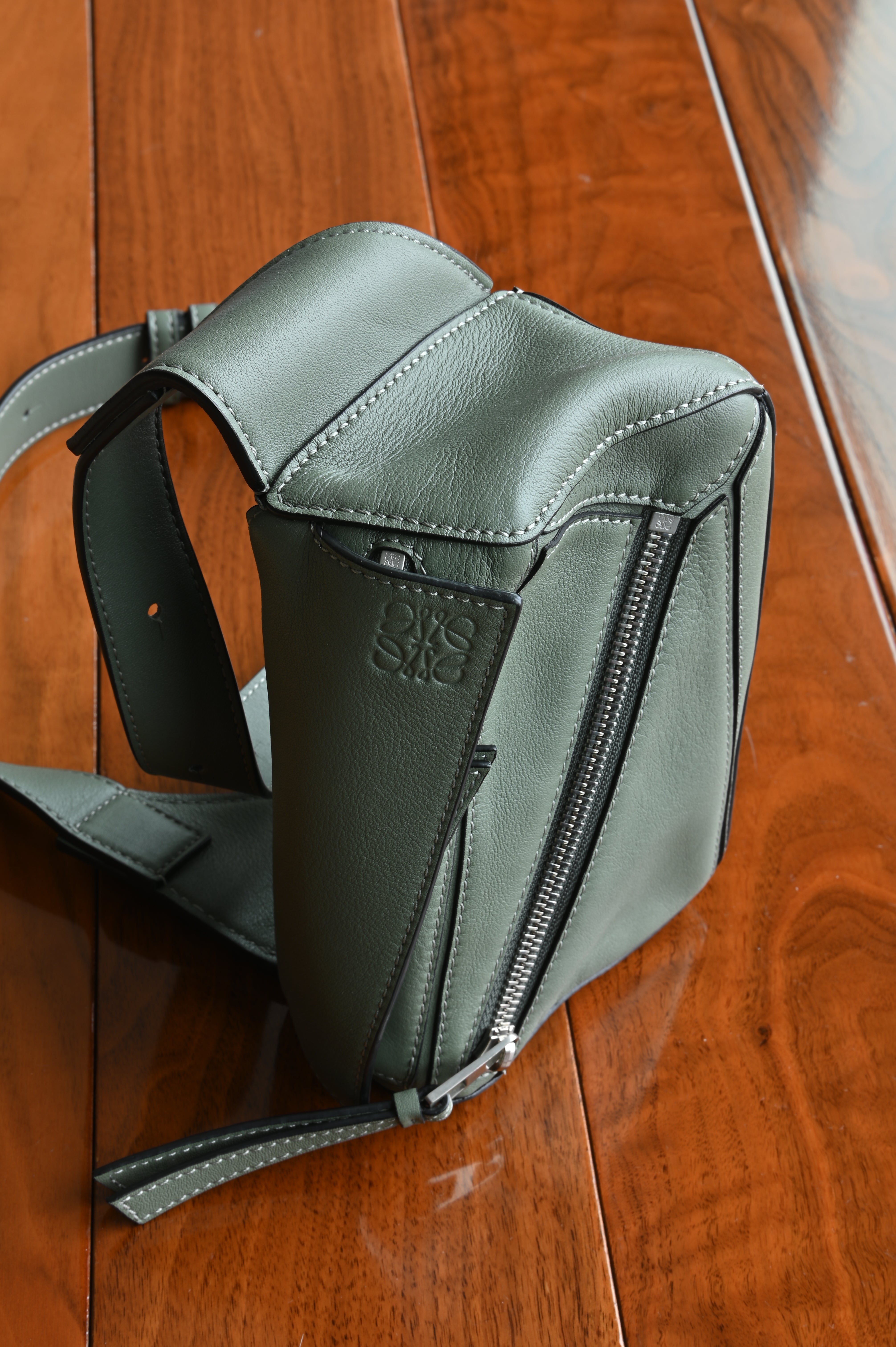 Loewe Sage Green Puzzle Edge Bag front two