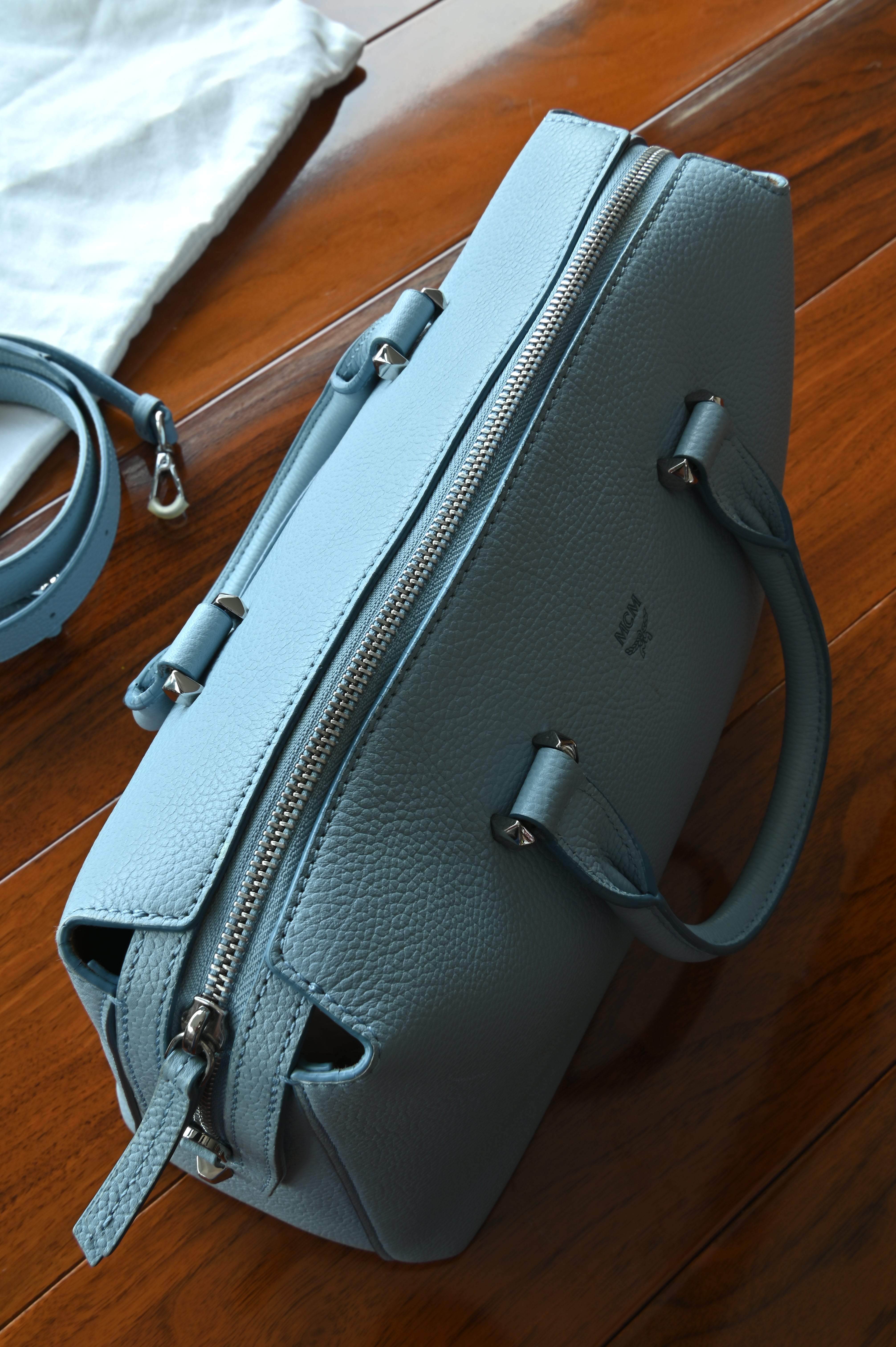 MCM Light Blue Crossbody Bag handle down