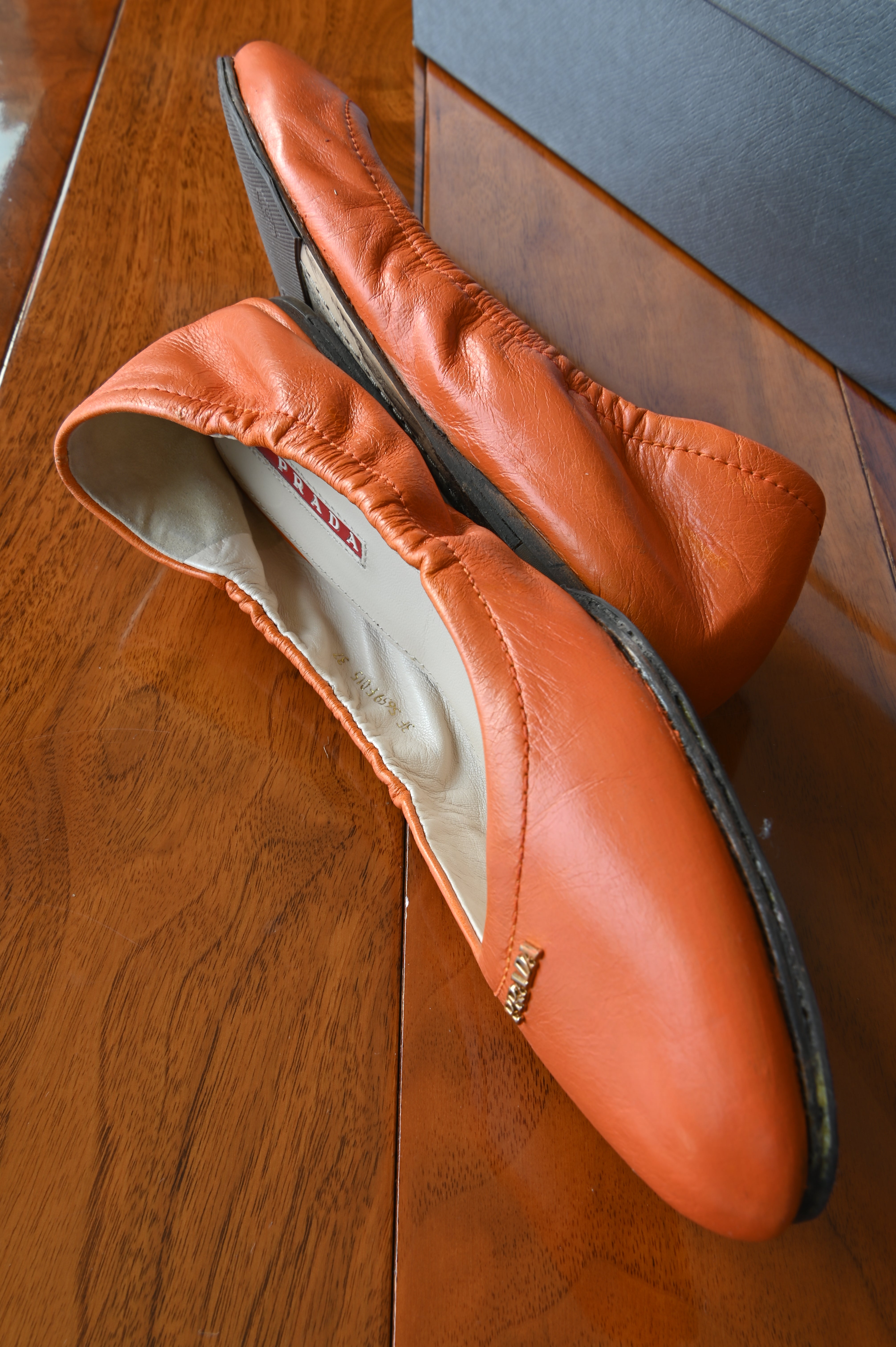 Prada Orange Ballerina Flats side