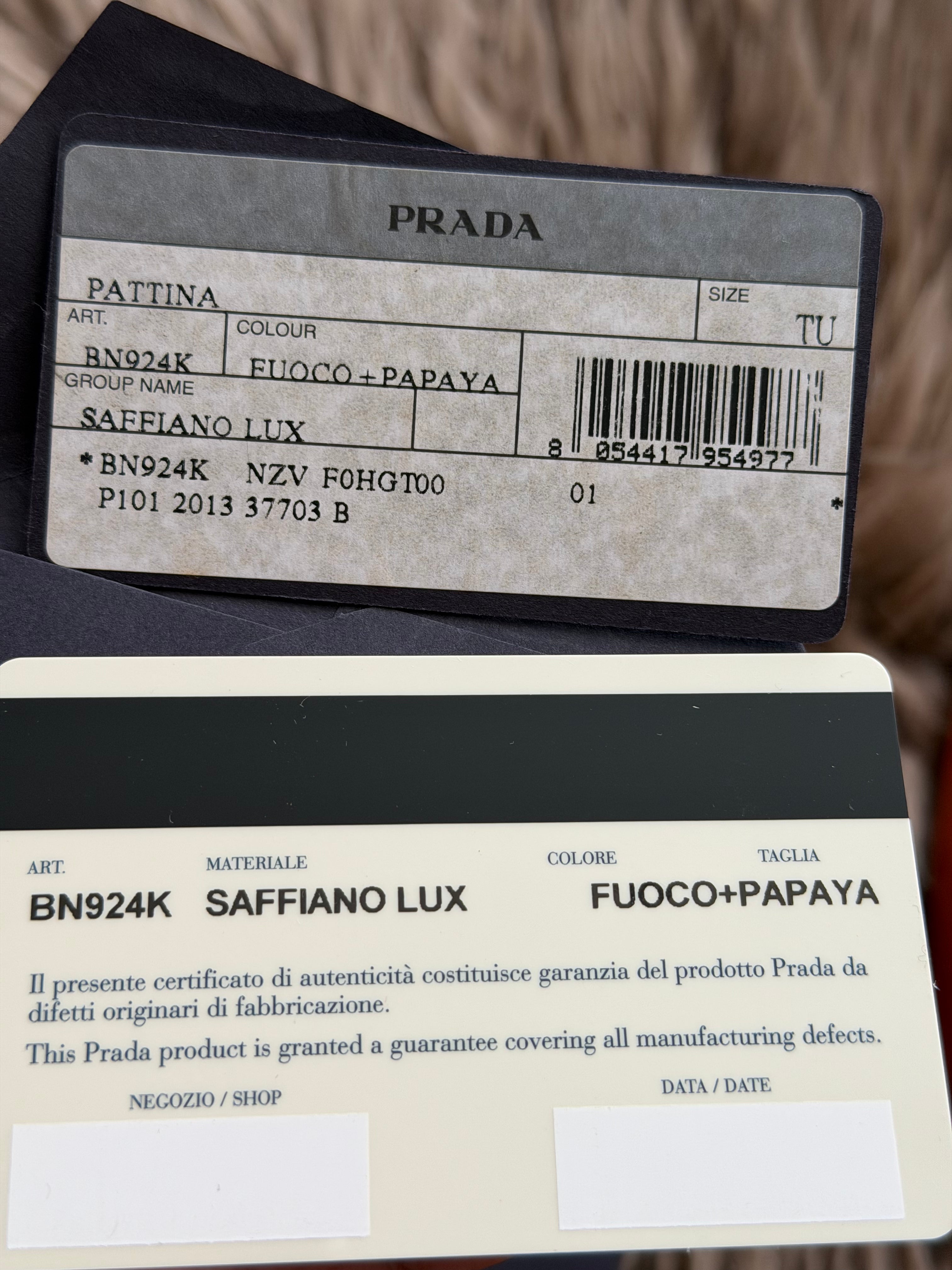 Prada two-way clutch bag Saffiano Lux in Fuoco Papaya card