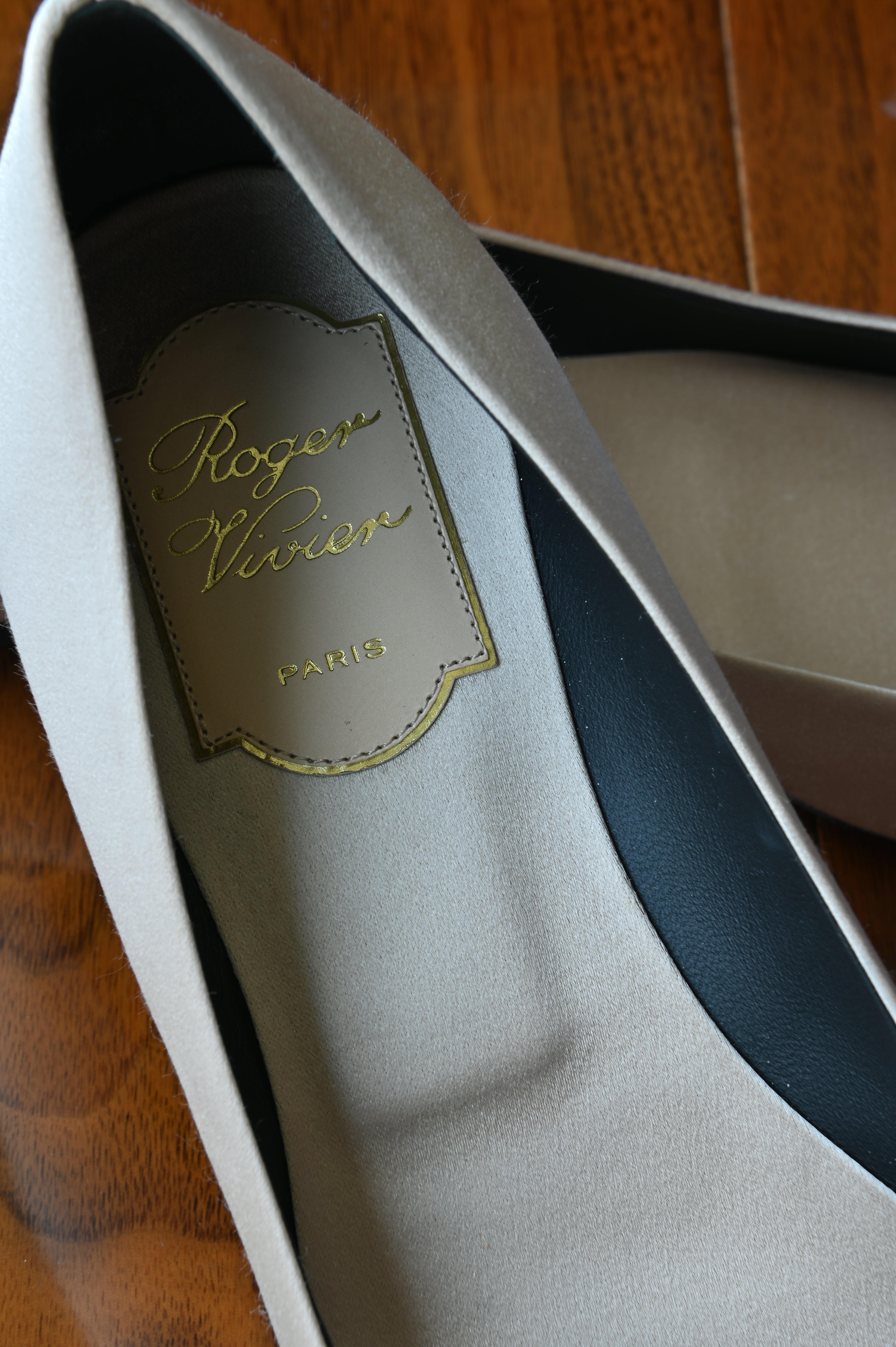 Roger Vivier Beige Satin Crystal Buckle Pumps logo closeup