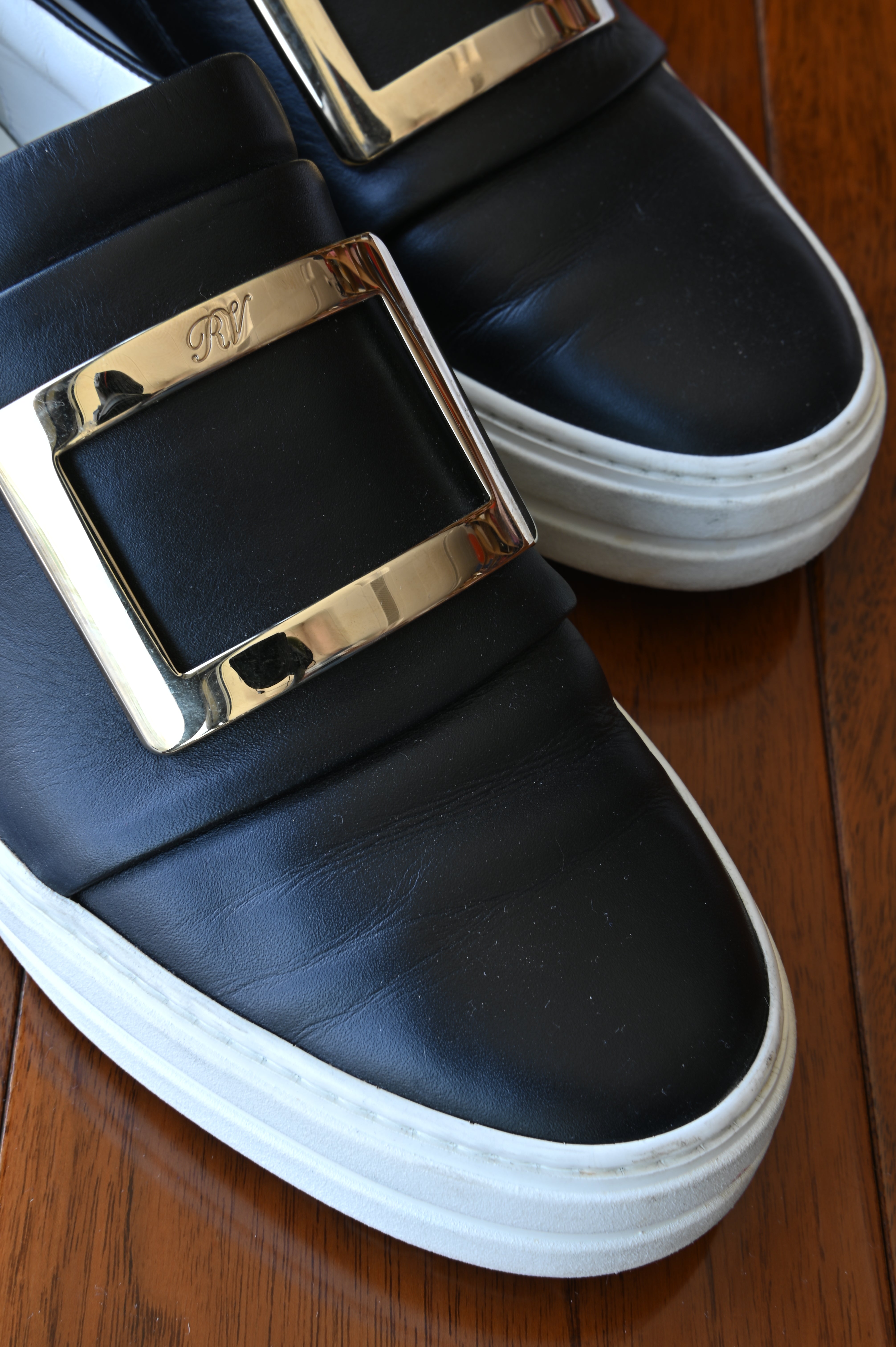 Roger Vivier Black Gold. Buckle Slip On Shoes front