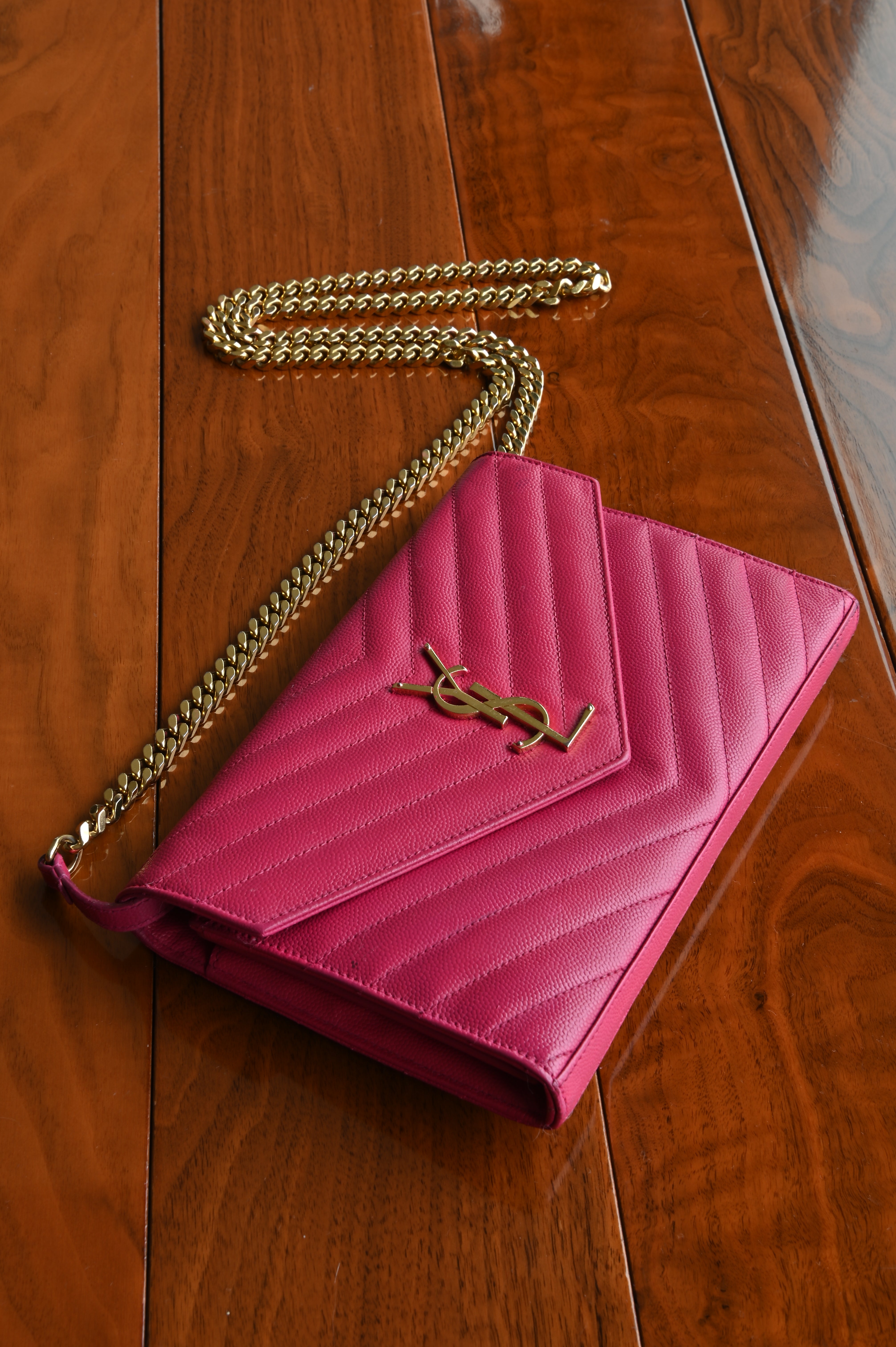 SAINT LAURENT Pink Cassandre Envelope Chain Wallet in Lambskin front