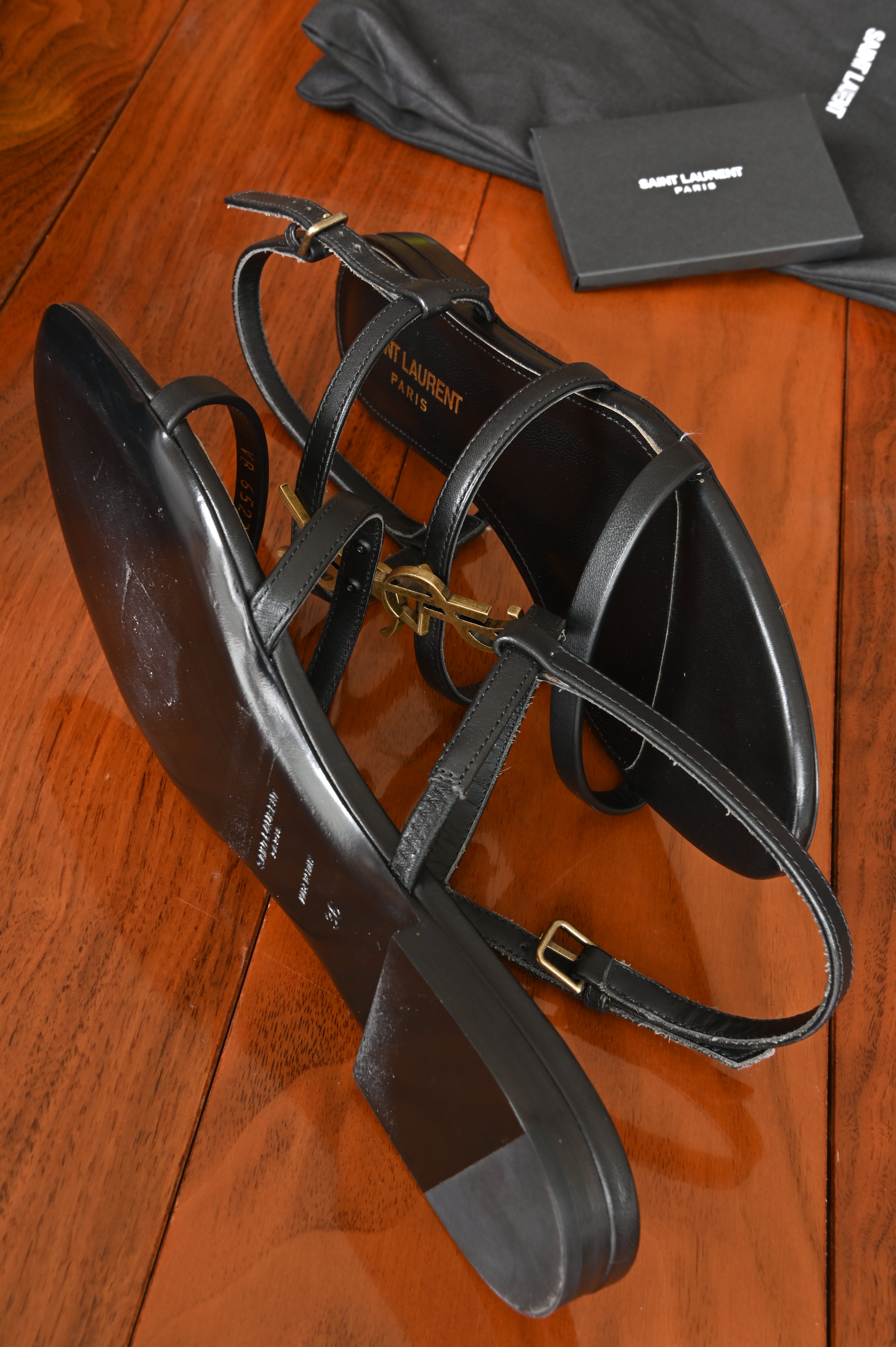 Saint Laurent Black Cassandra Flat Thong Sandals side two
