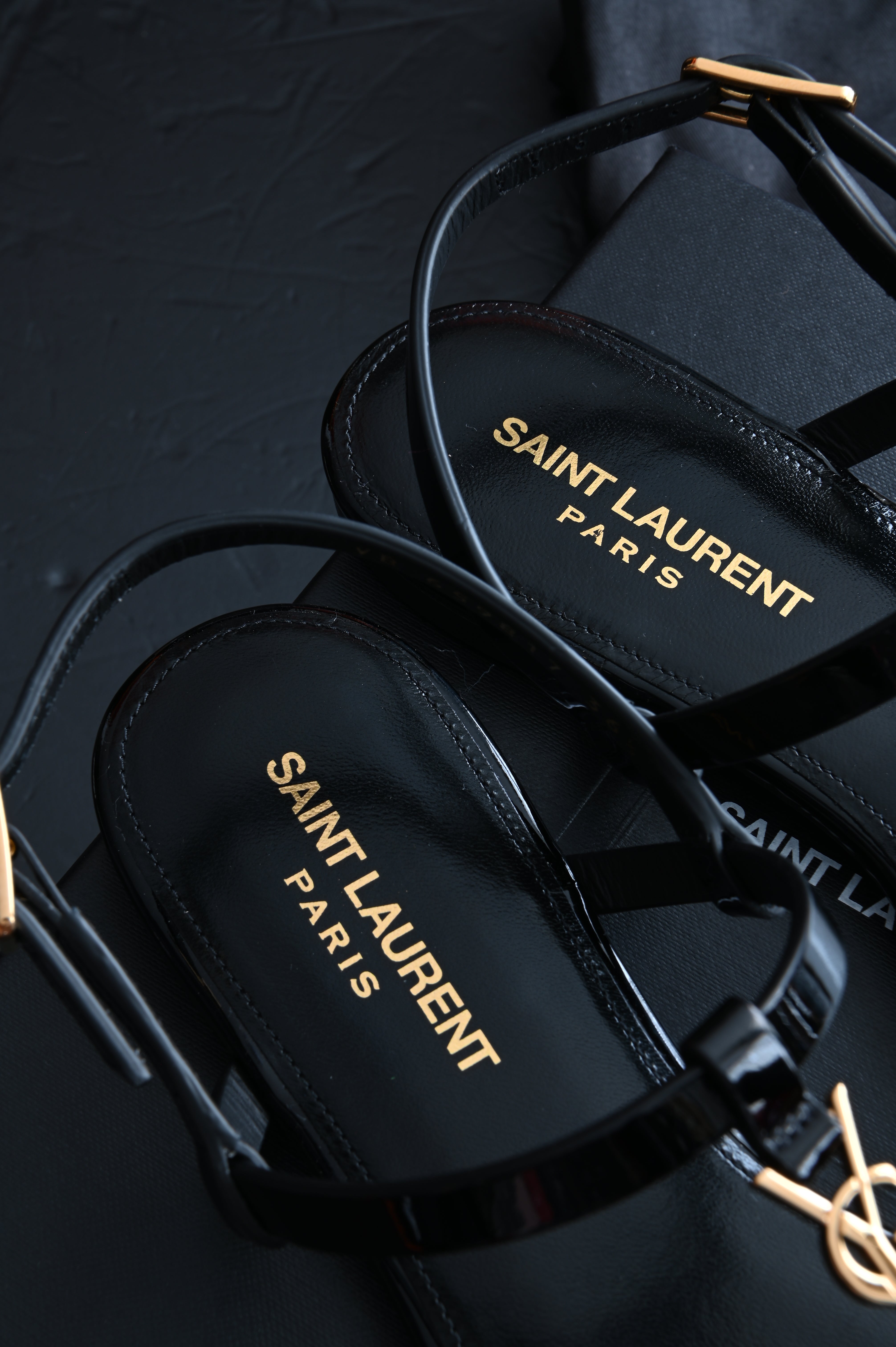 Saint Laurent Cassandra Thong sandals flats in patent and gold hardware