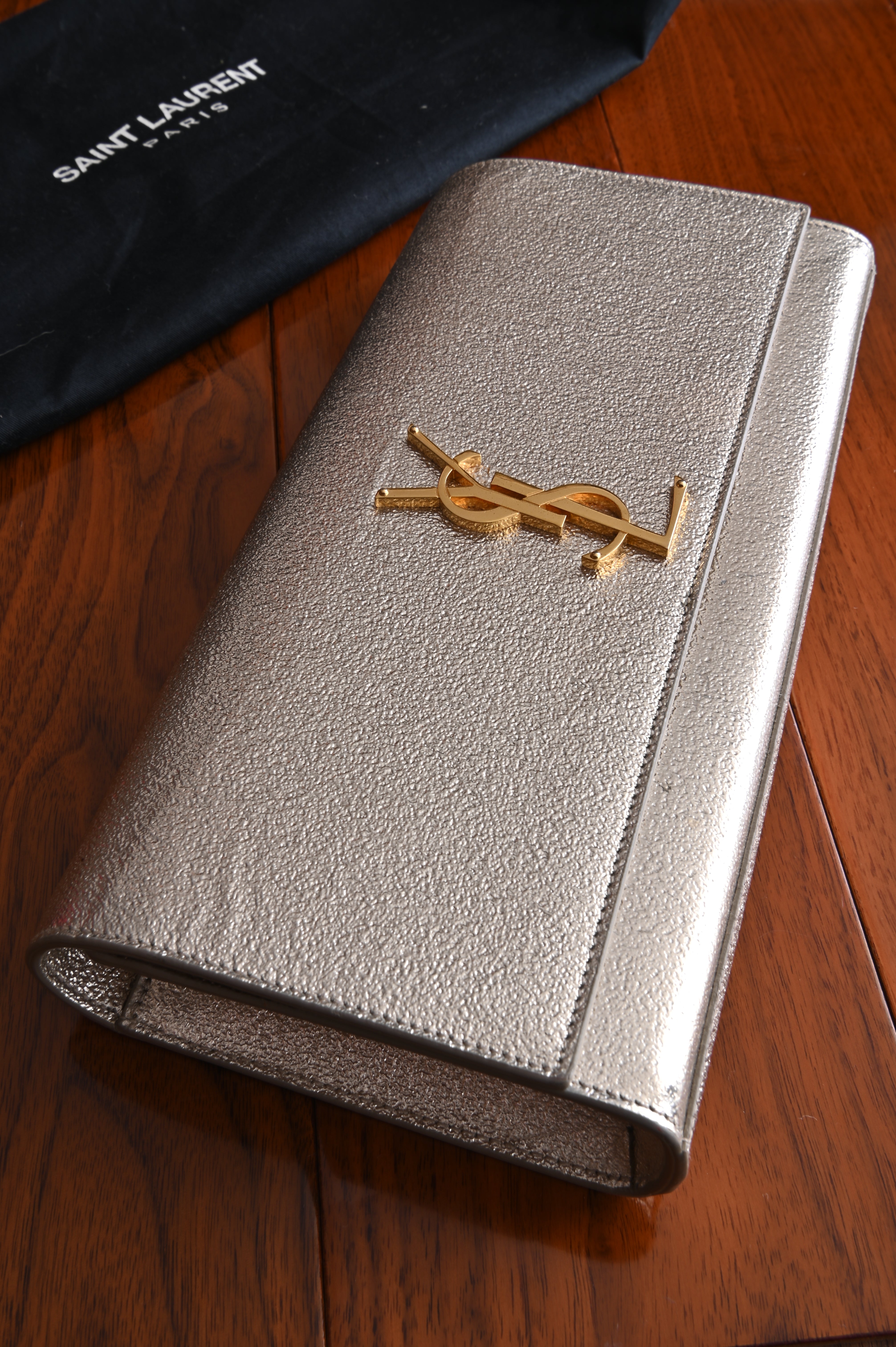 Saint Laurent Metallic Gold clutch front