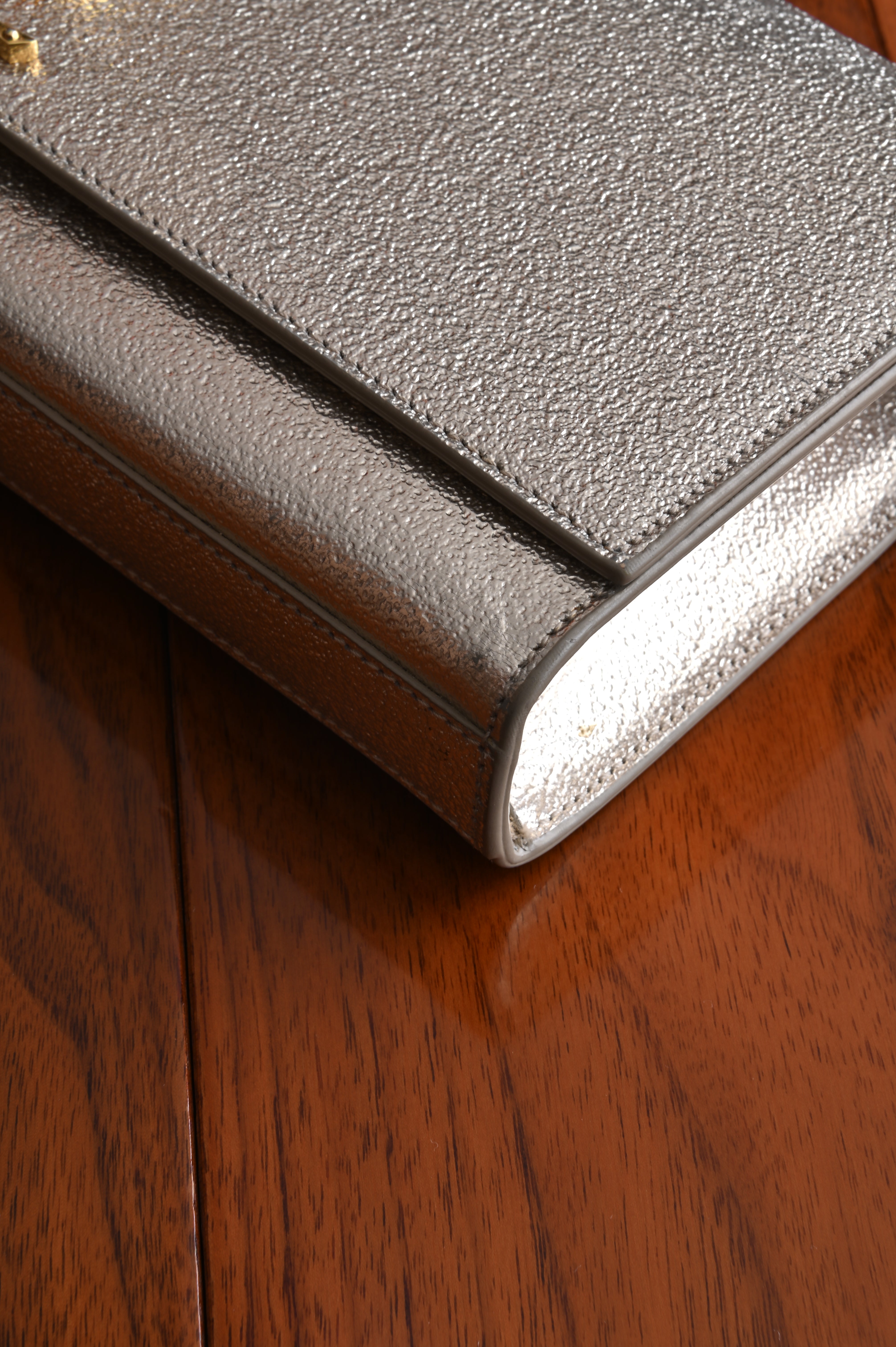 Saint Laurent Metallic Gold clutch right corner