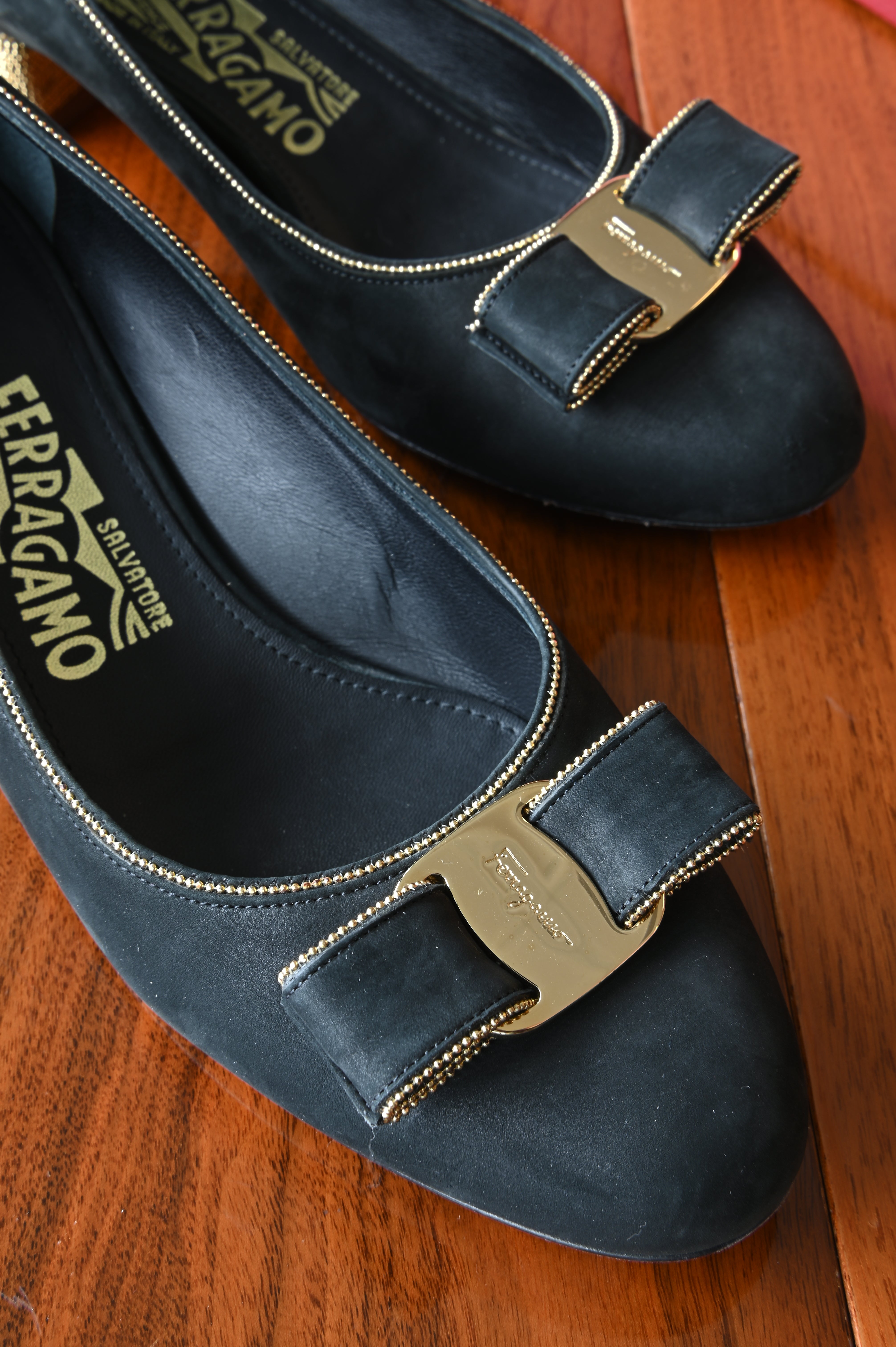 Salvatore Ferragamo Black Velvet Vara Pumps in Gold Hardware front