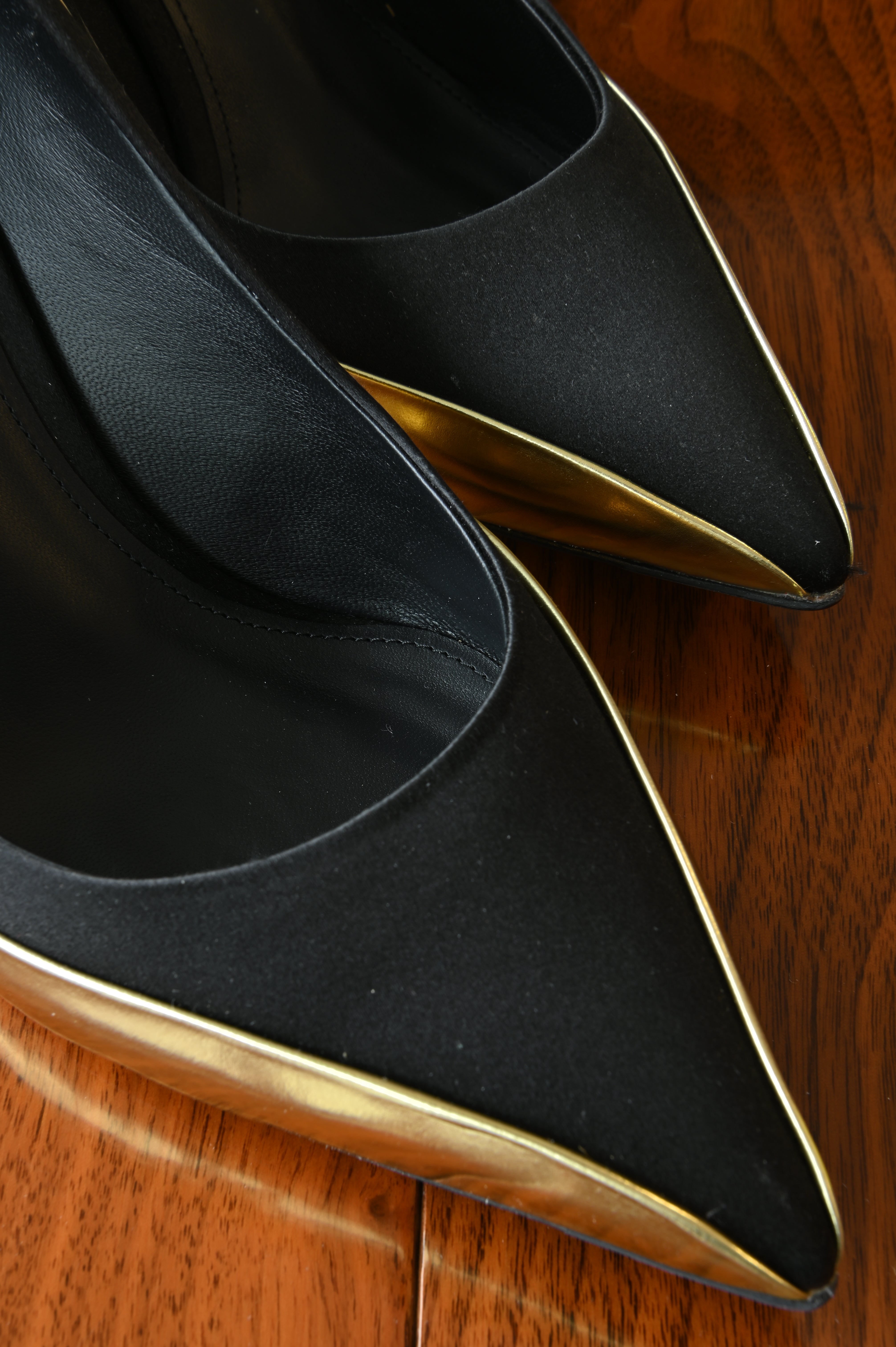 Salvatore Ferragamo Pointed Black Gold Pumps front