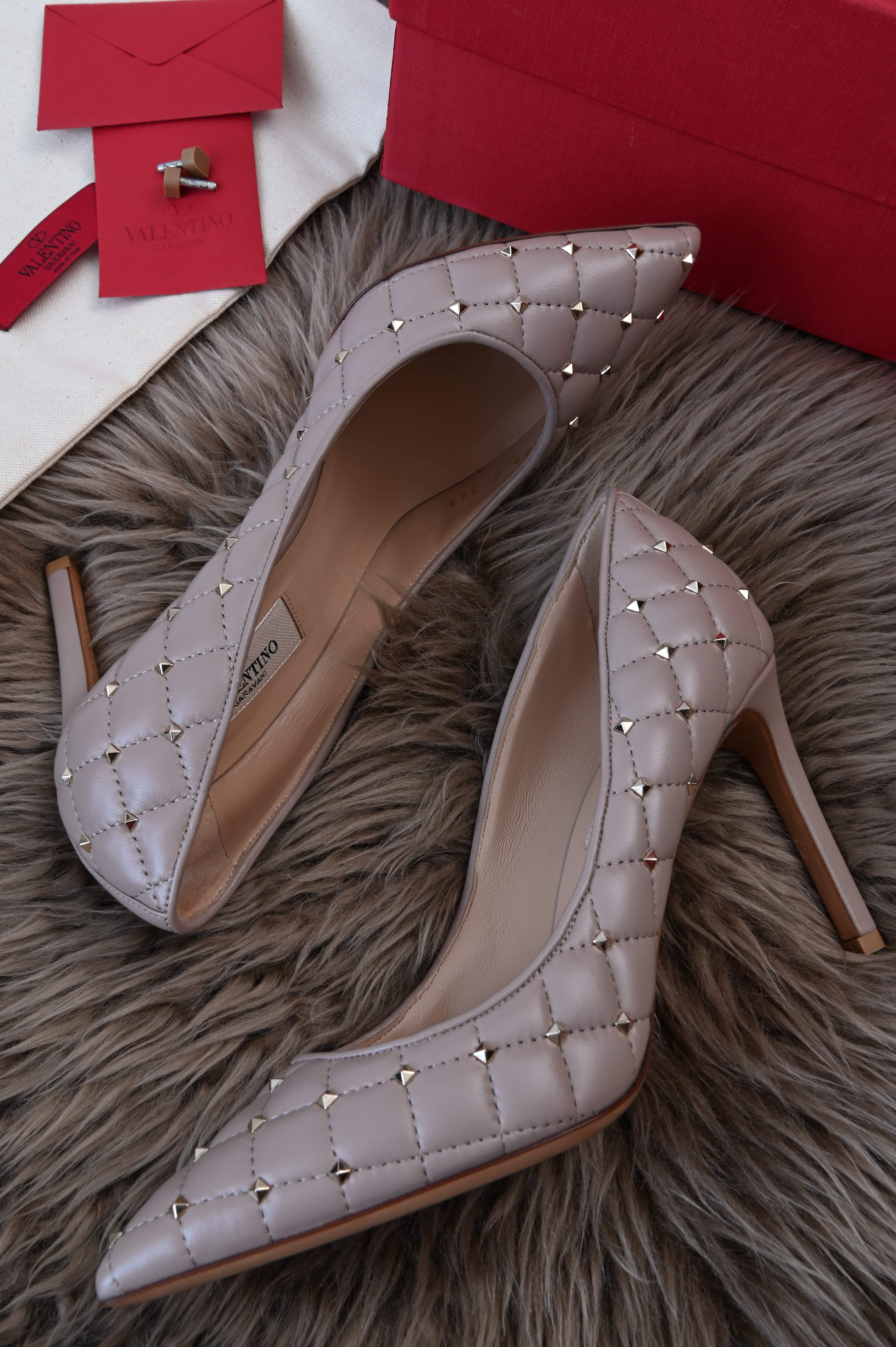 Valentino Beige quilted leather rockstud pumps with light gold hardware size 36 sides
