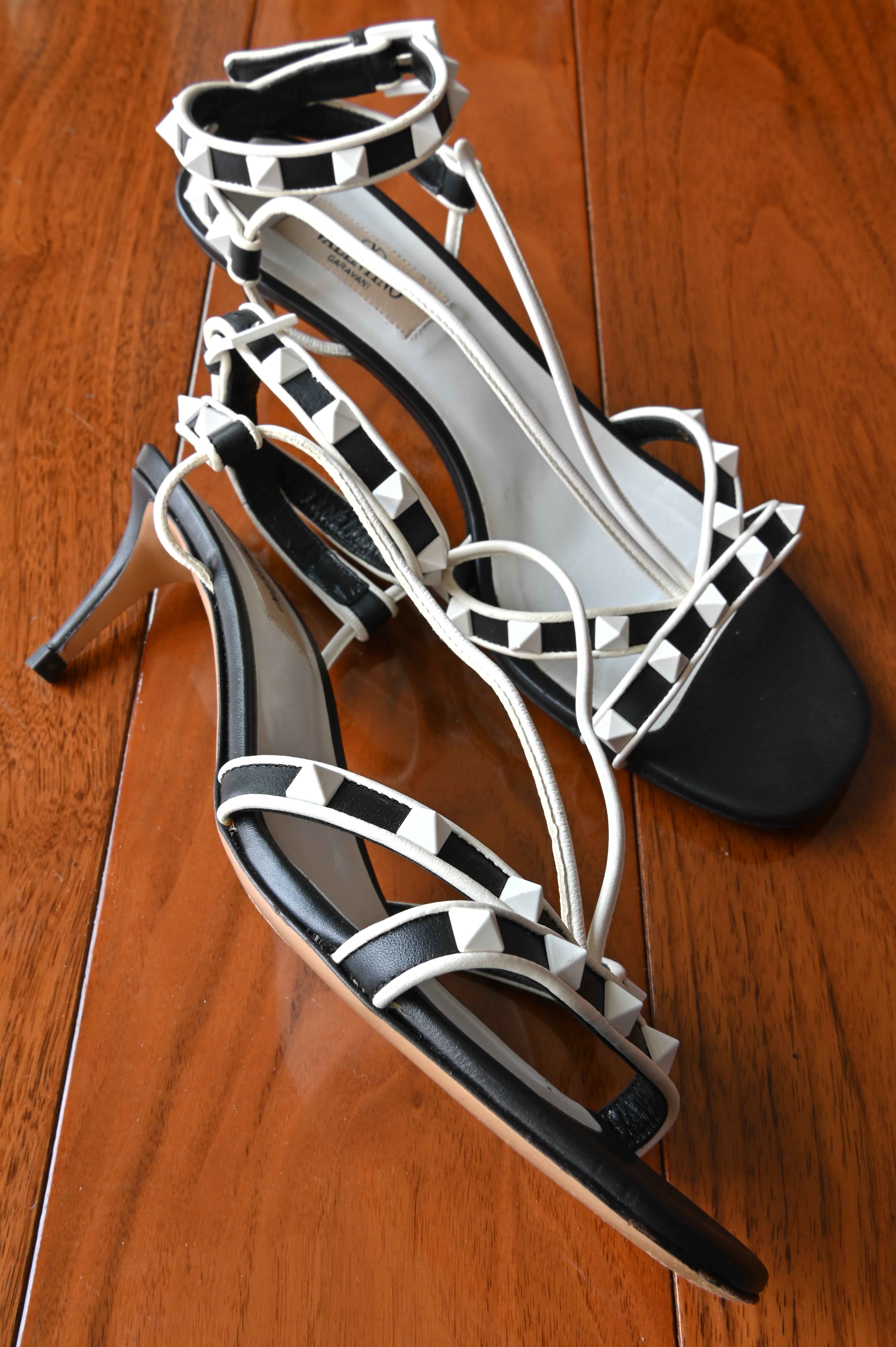 Valentino Garavani Black White Rockstud Cage Sandals left