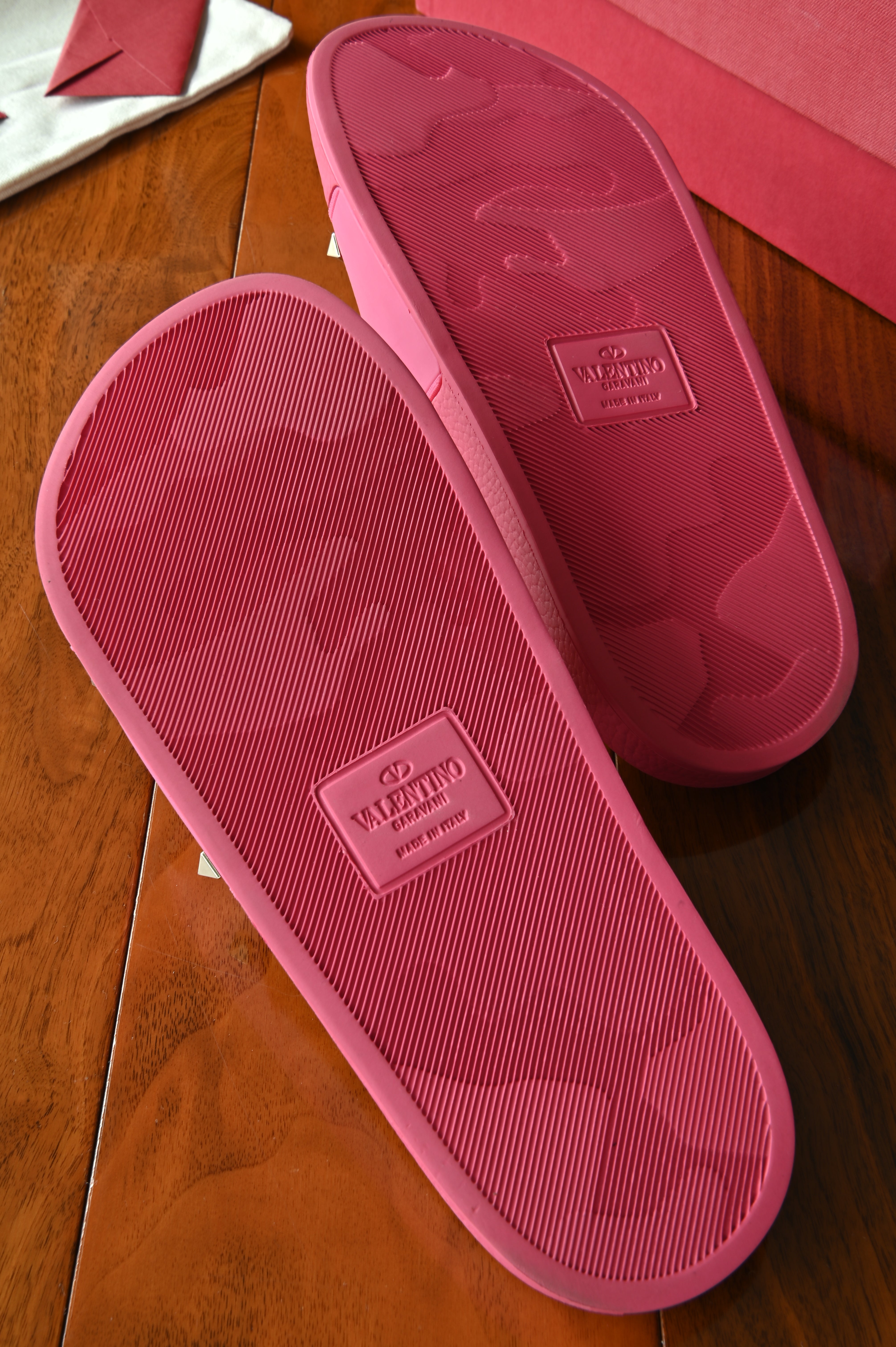 Valentino Garavani Pink Rockstud Rubber Slippers bottom