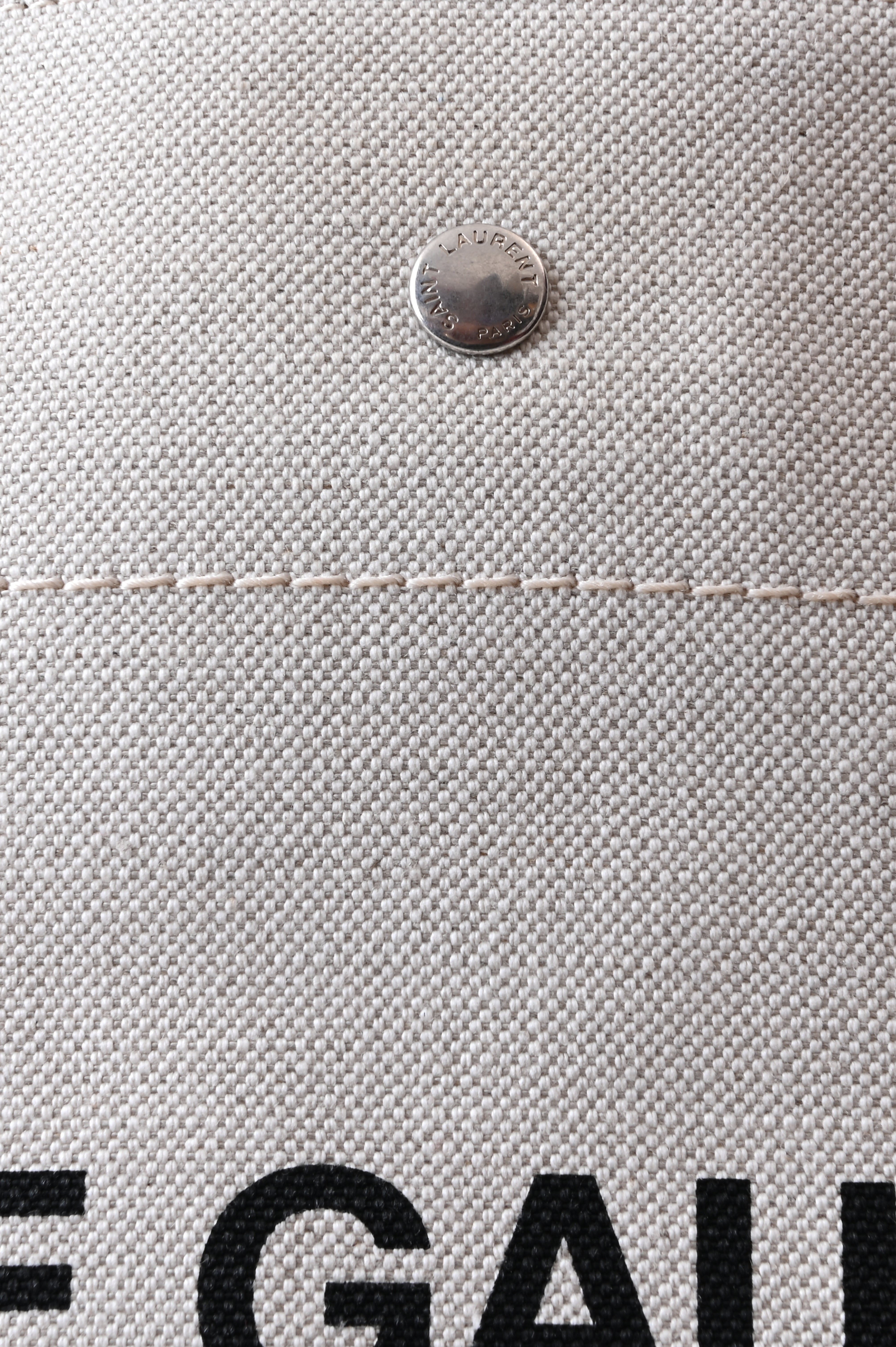 Saint Laurent Rive Gauche Bucket Bag in White Linen