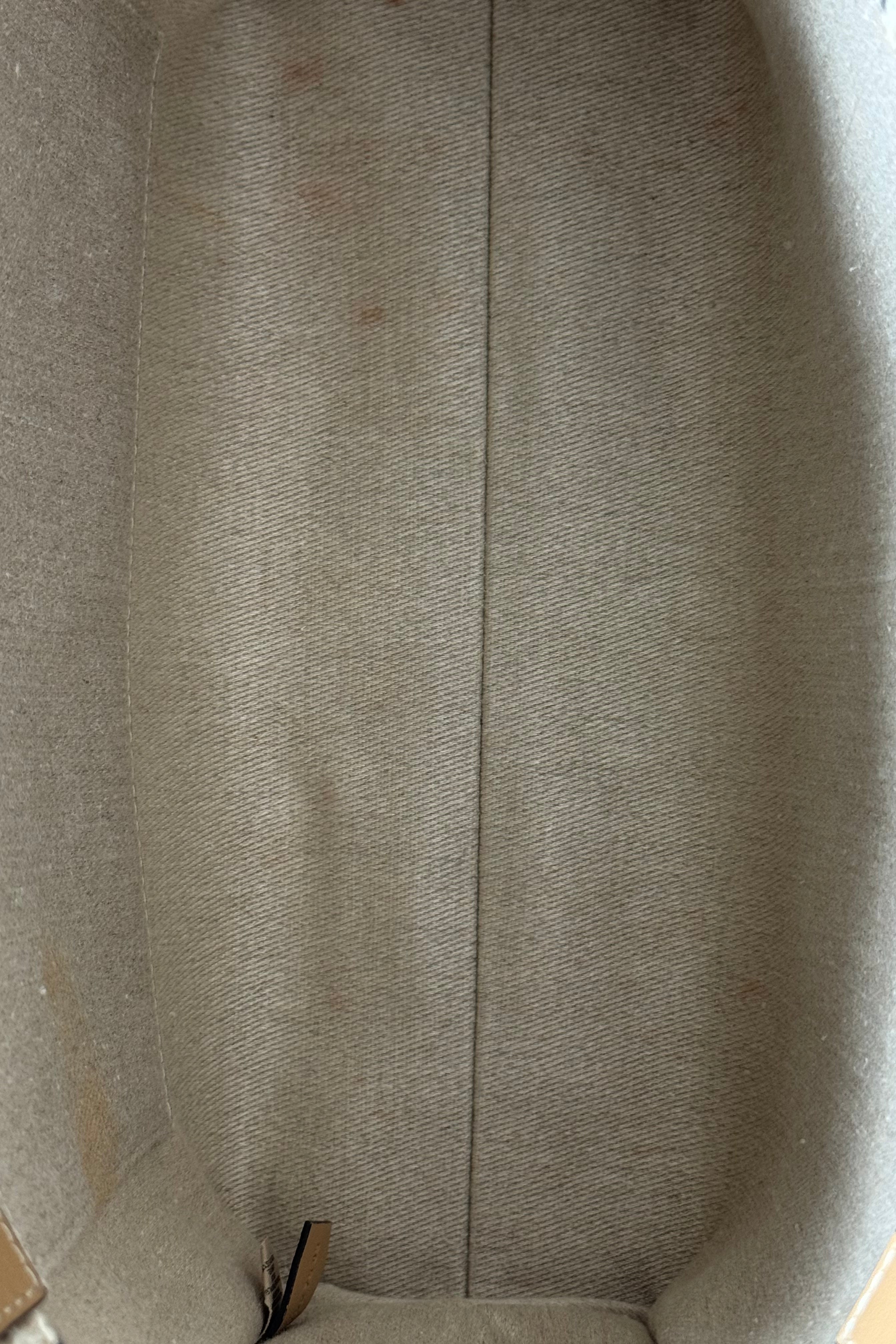 Authentic Chloé Woody Medium Striped Tote Bag showing the bottom panel and canvas construction in unused condition.