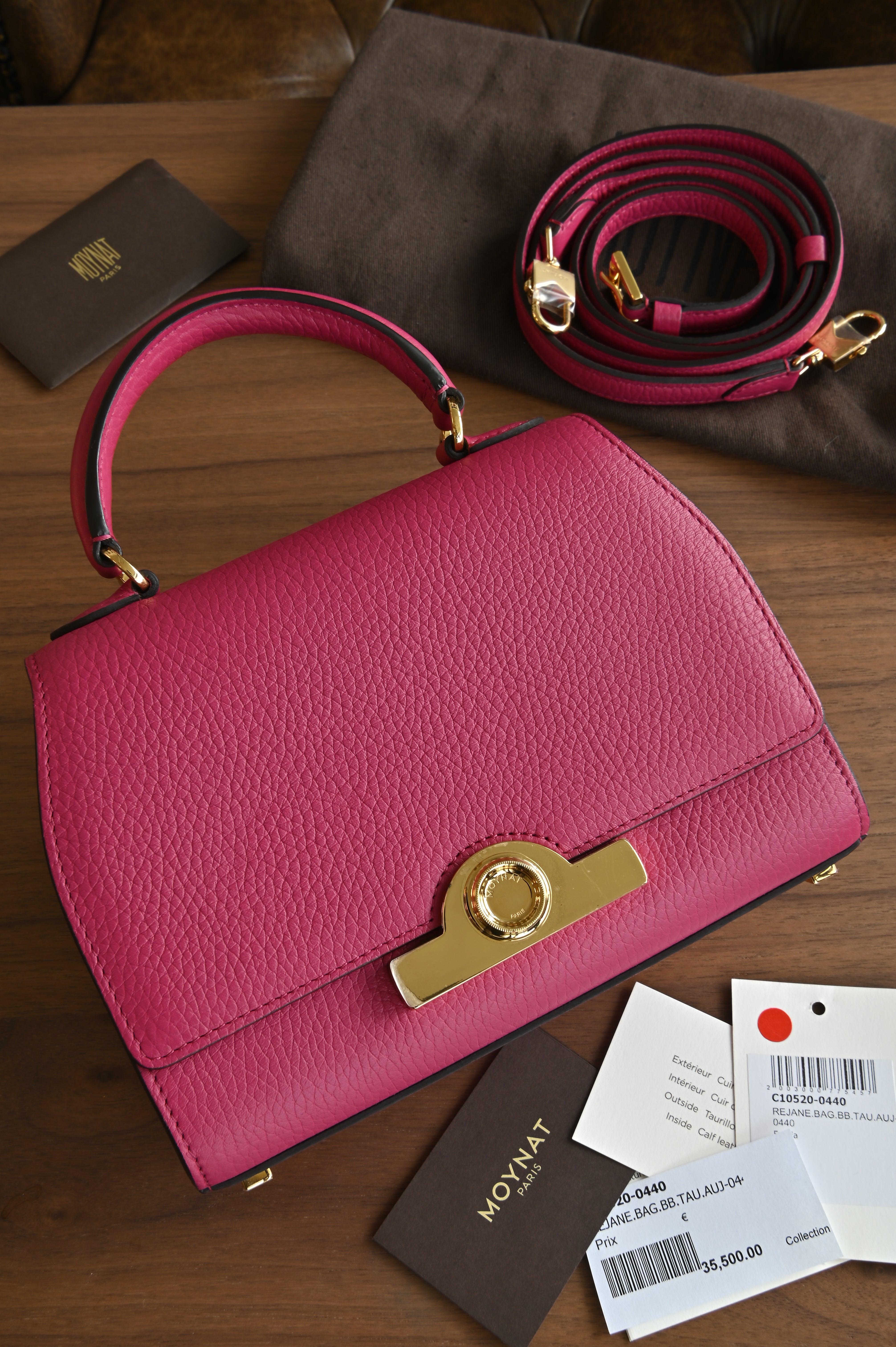Authentic preloved Moynat Rejane BB in fuchsia pink Taurillon leather with gold hardware – main view