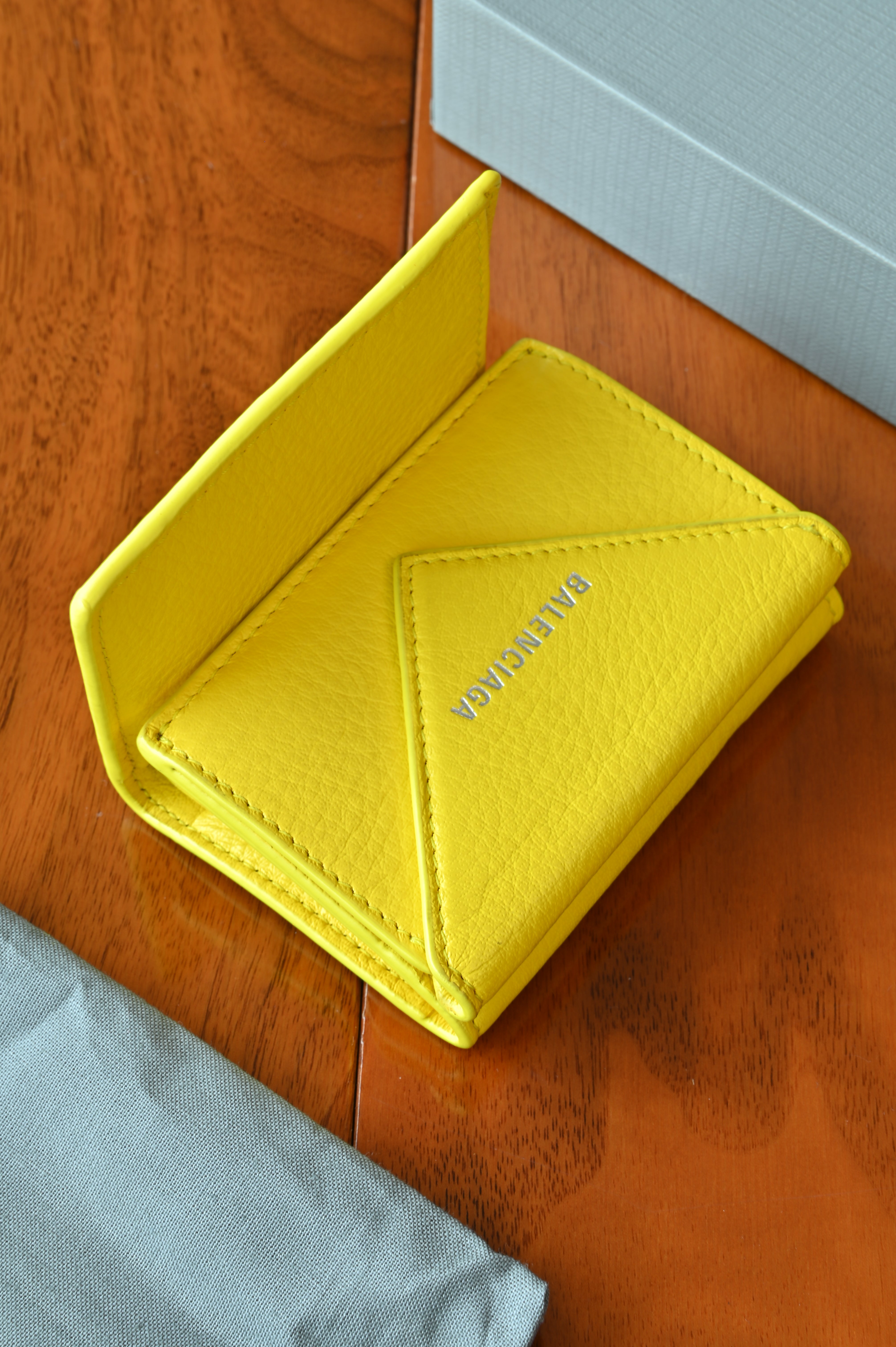 Balenciaga Yellow Trifold Compact Wallet logo