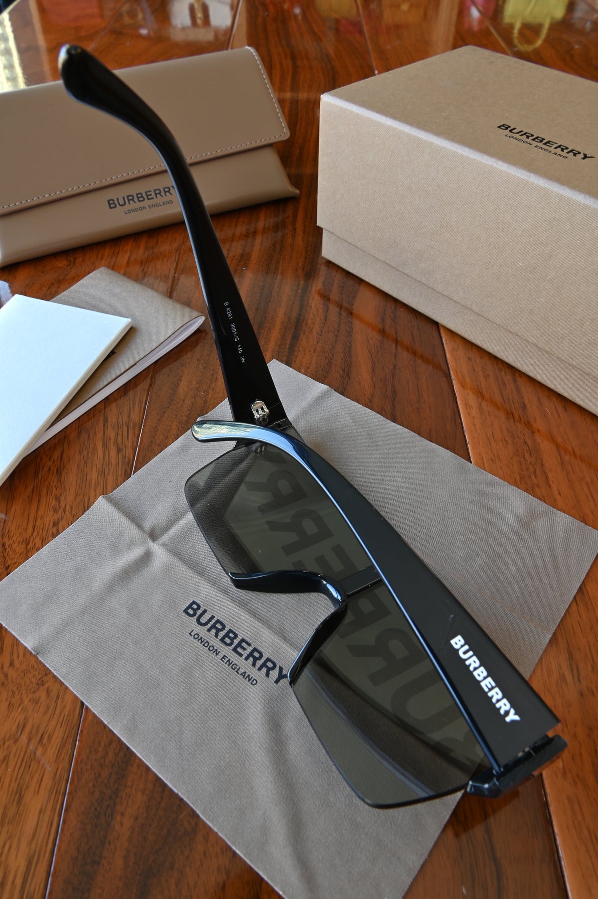 Burberry Logo Sports Sunglasses left