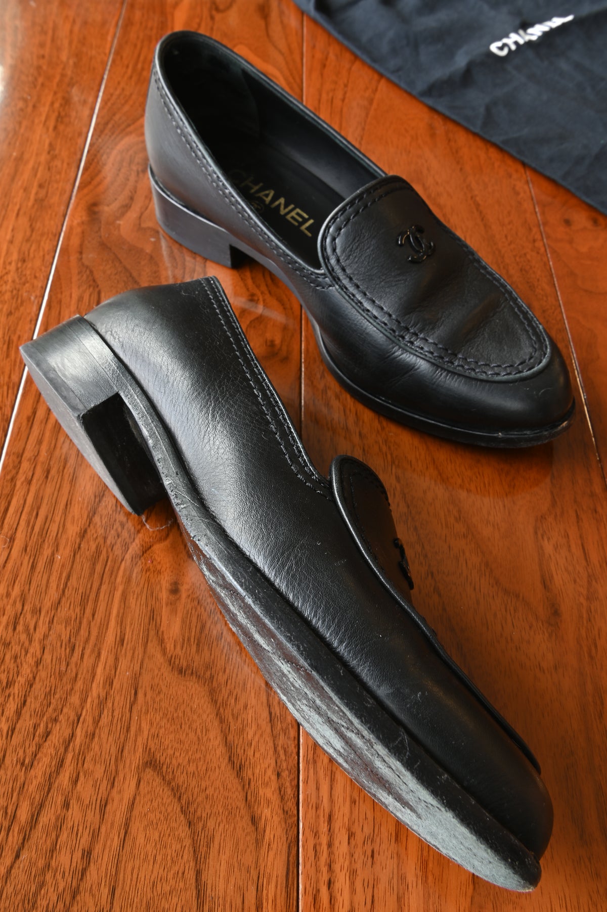 Chanel Black CC Loafers left