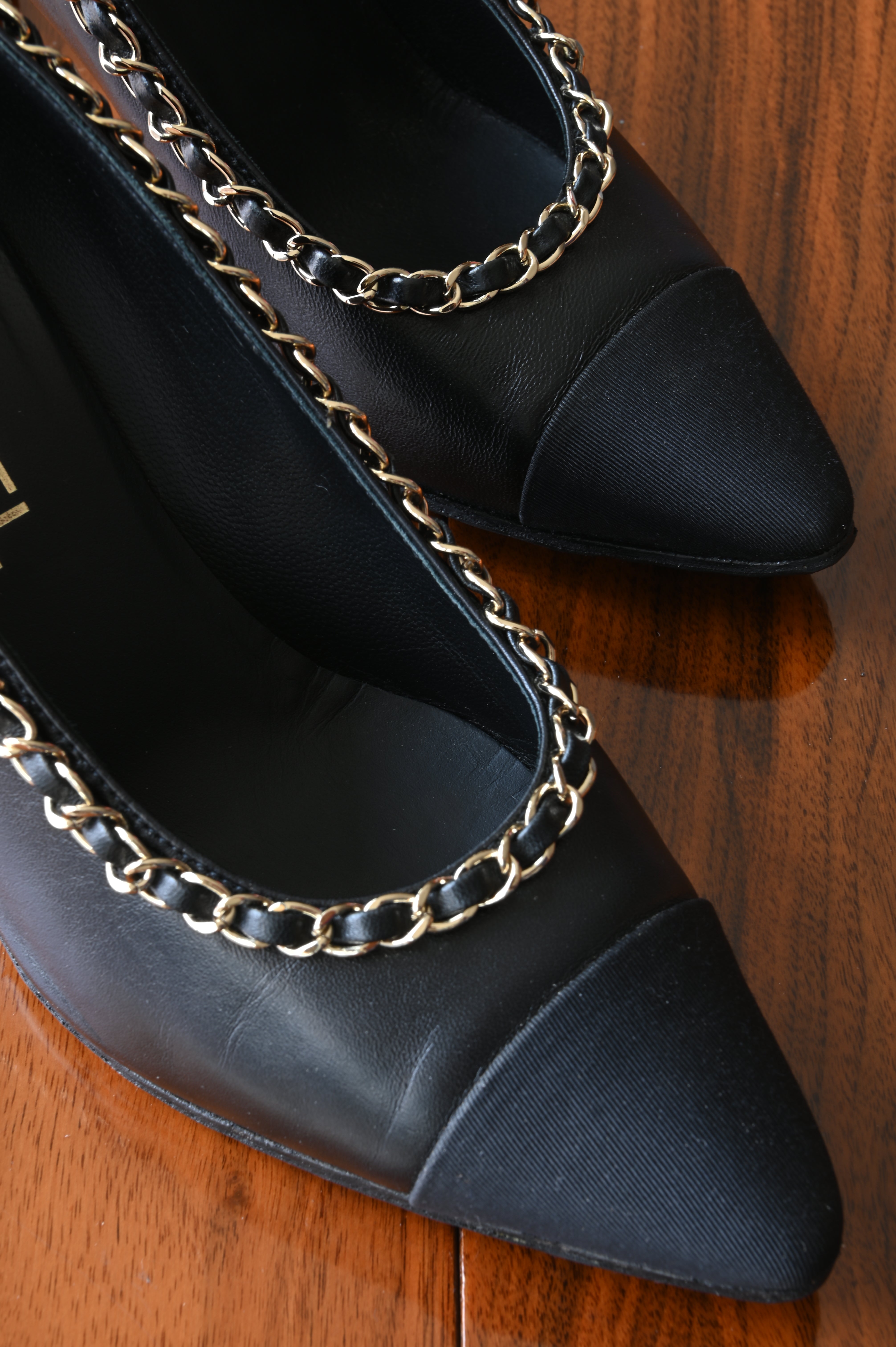 Chanel Black Lamb Leather Chain Pumps front