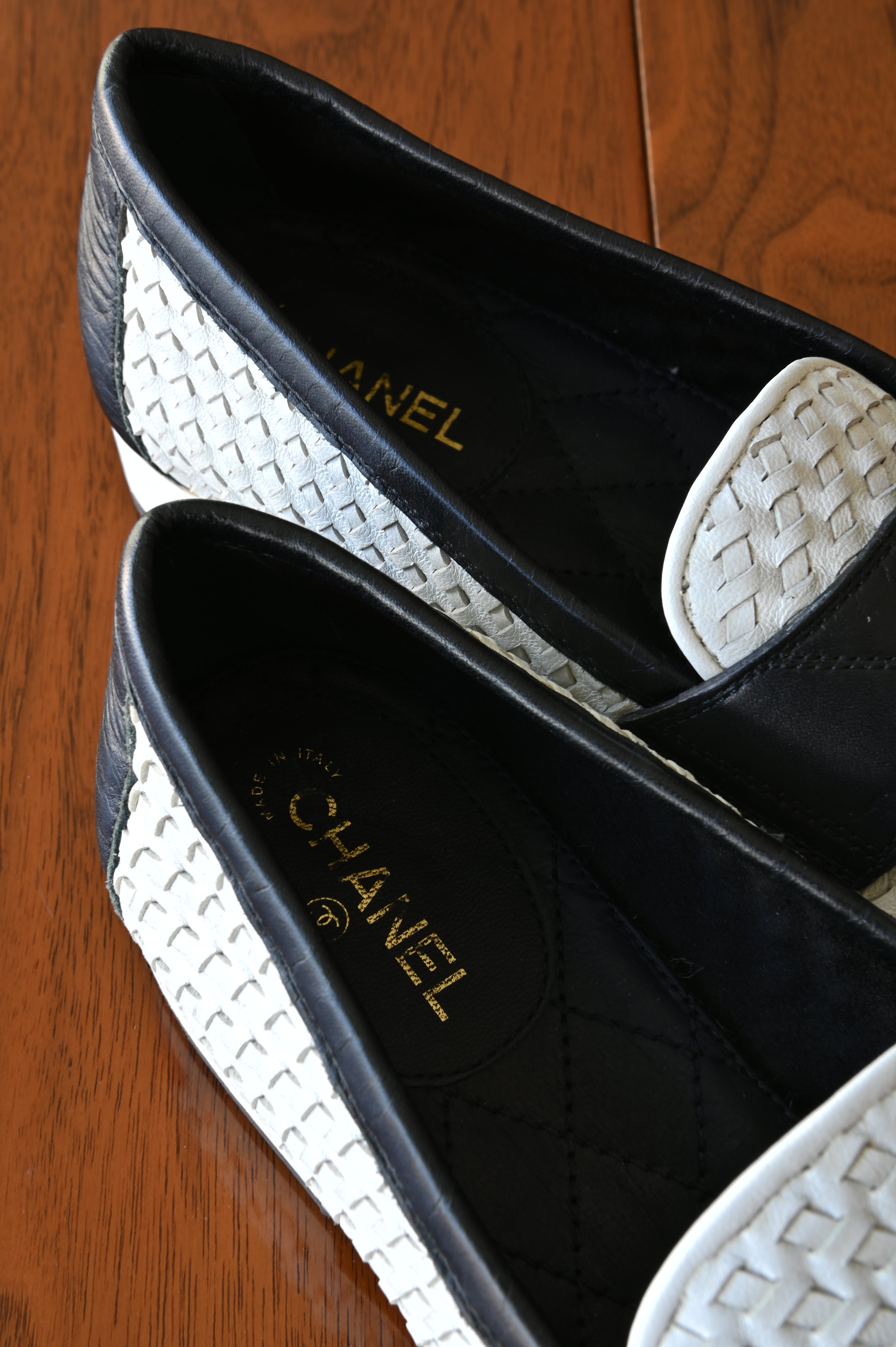 Chanel Black White Woven Leather Loafers logo