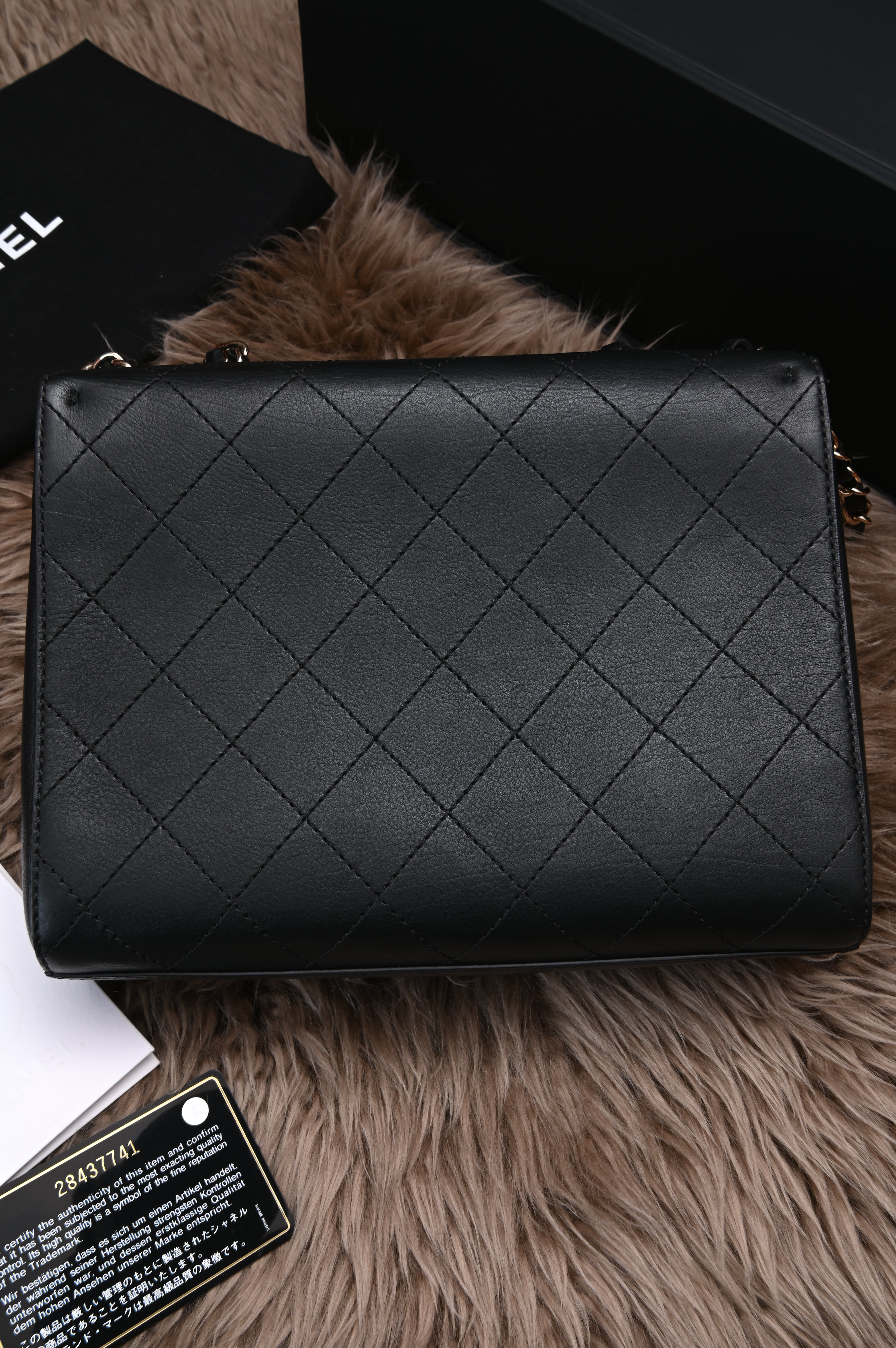 Chanel CC quilted flap bag in black calfskin