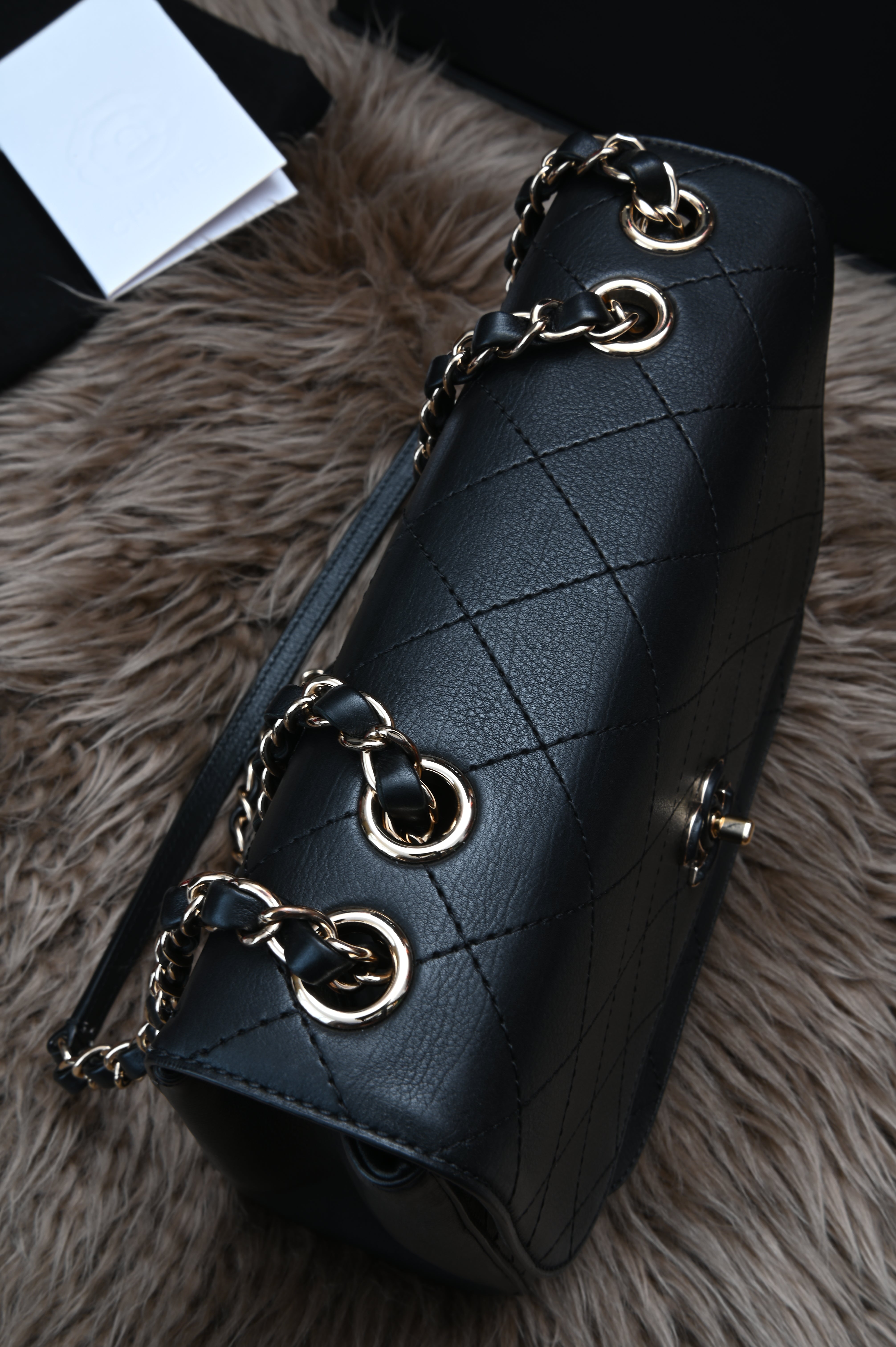 Chanel CC quilted flap bag in black calfskin