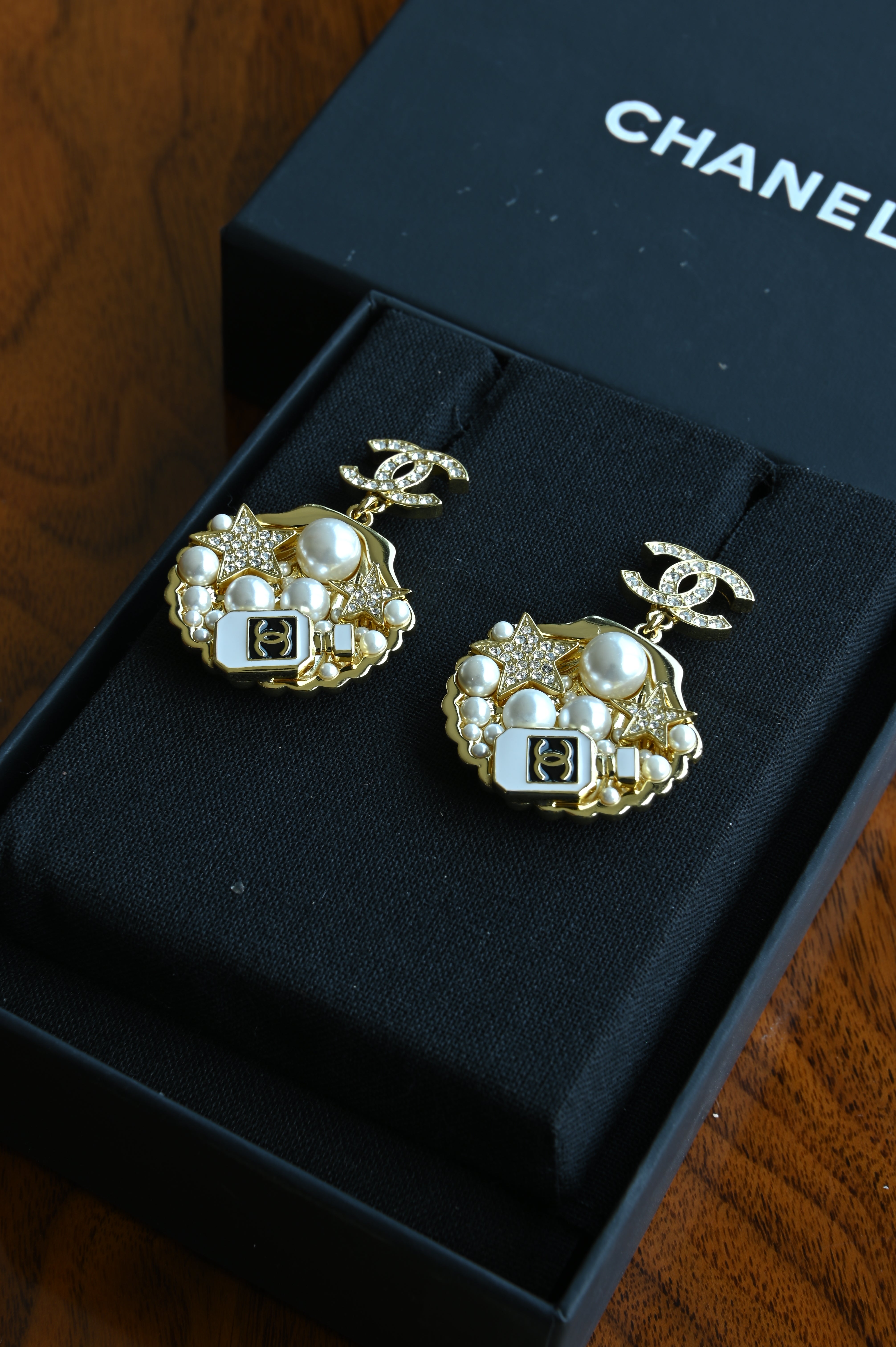 Chanel Gold Shell Pendant Earrings front