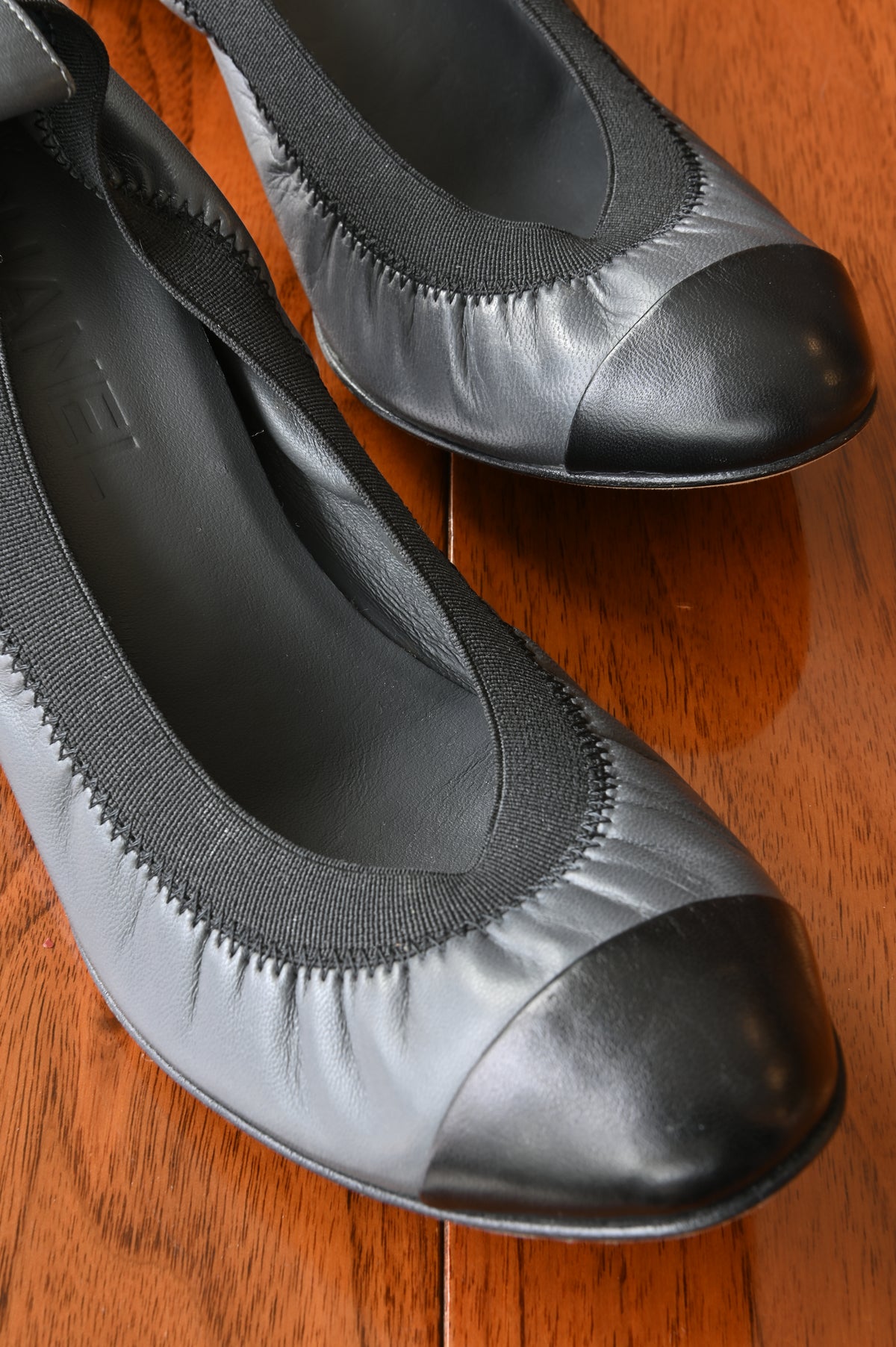 Chanel Grey Black Ballerina Pumps front