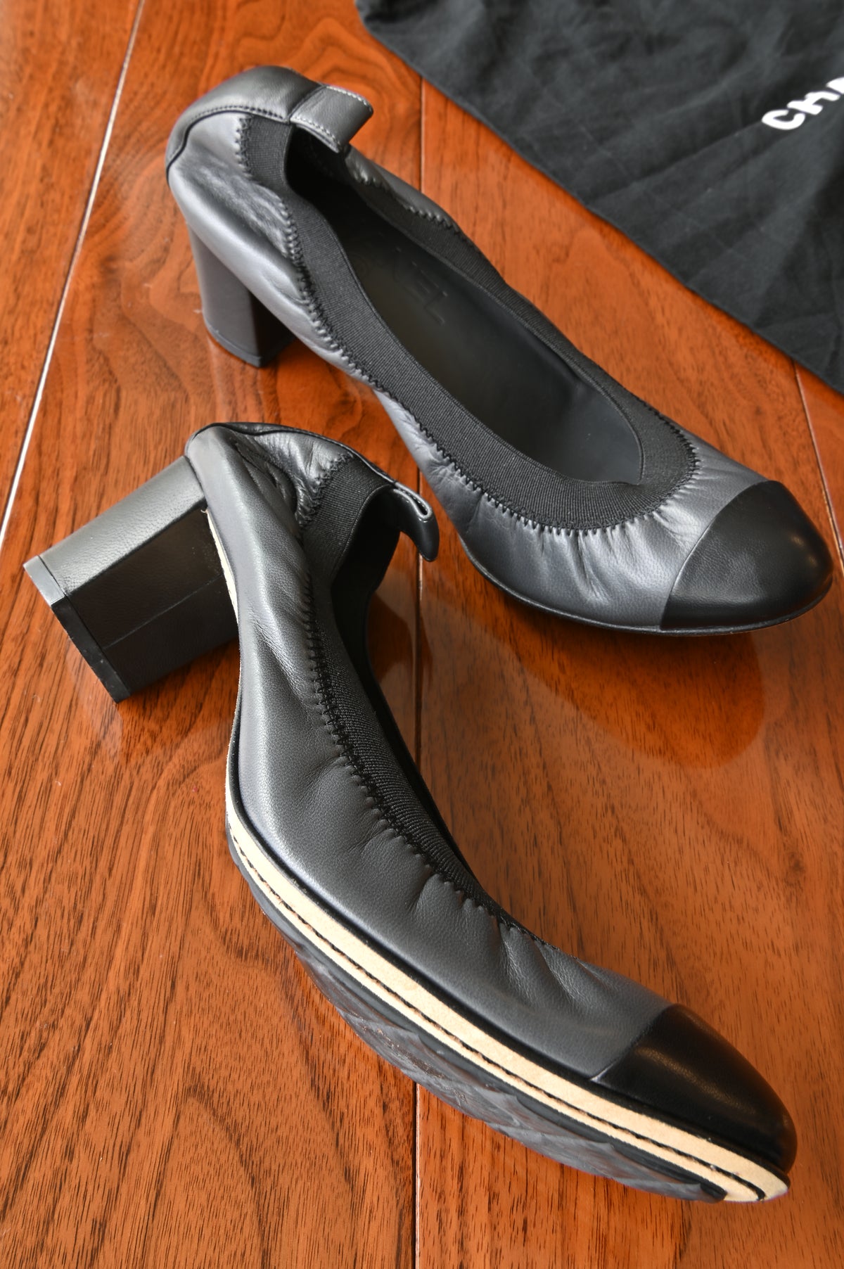 Chanel Grey Black Ballerina Pumps left