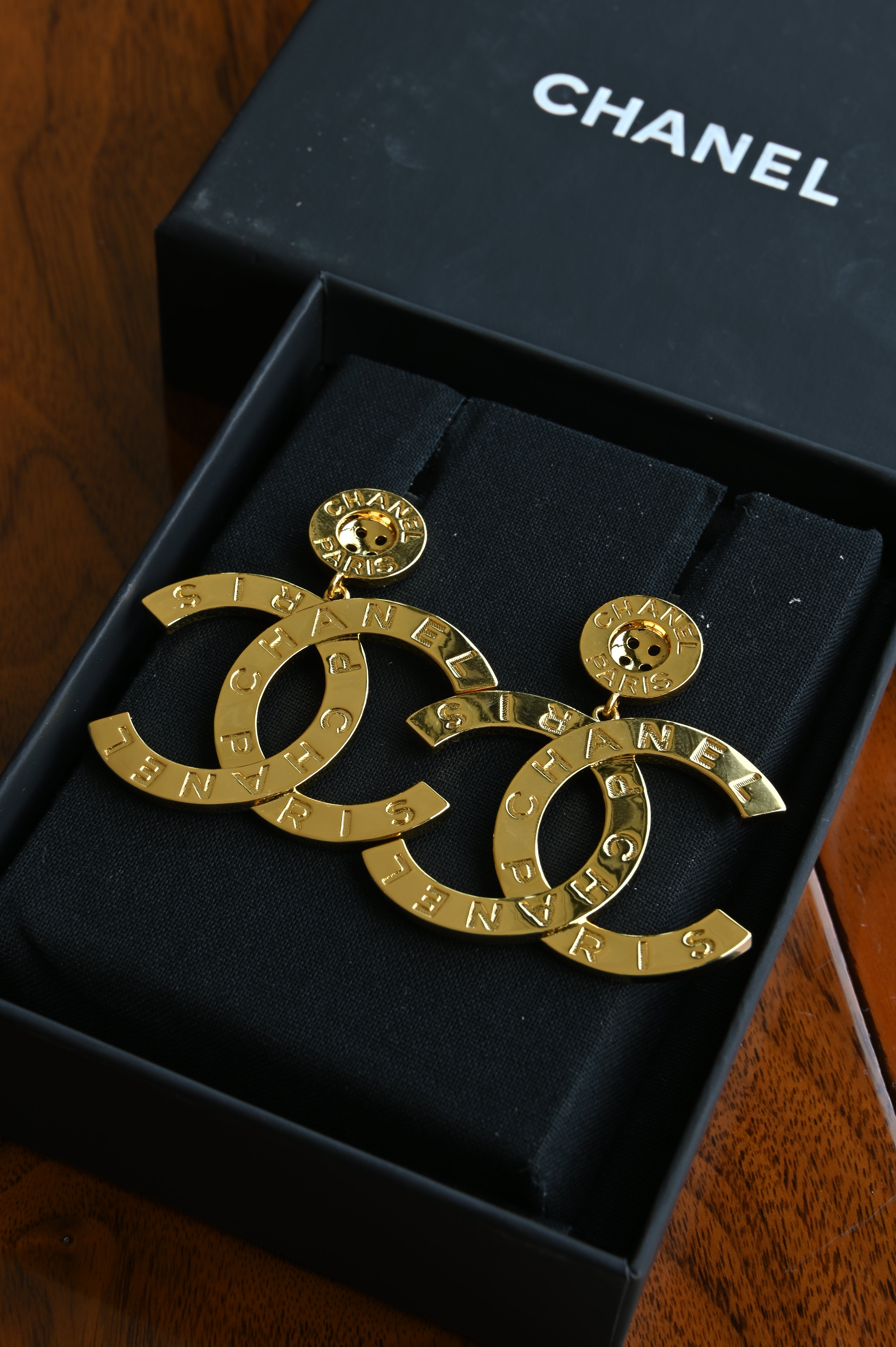 Chanel Large Gold Paris Button Earrings front