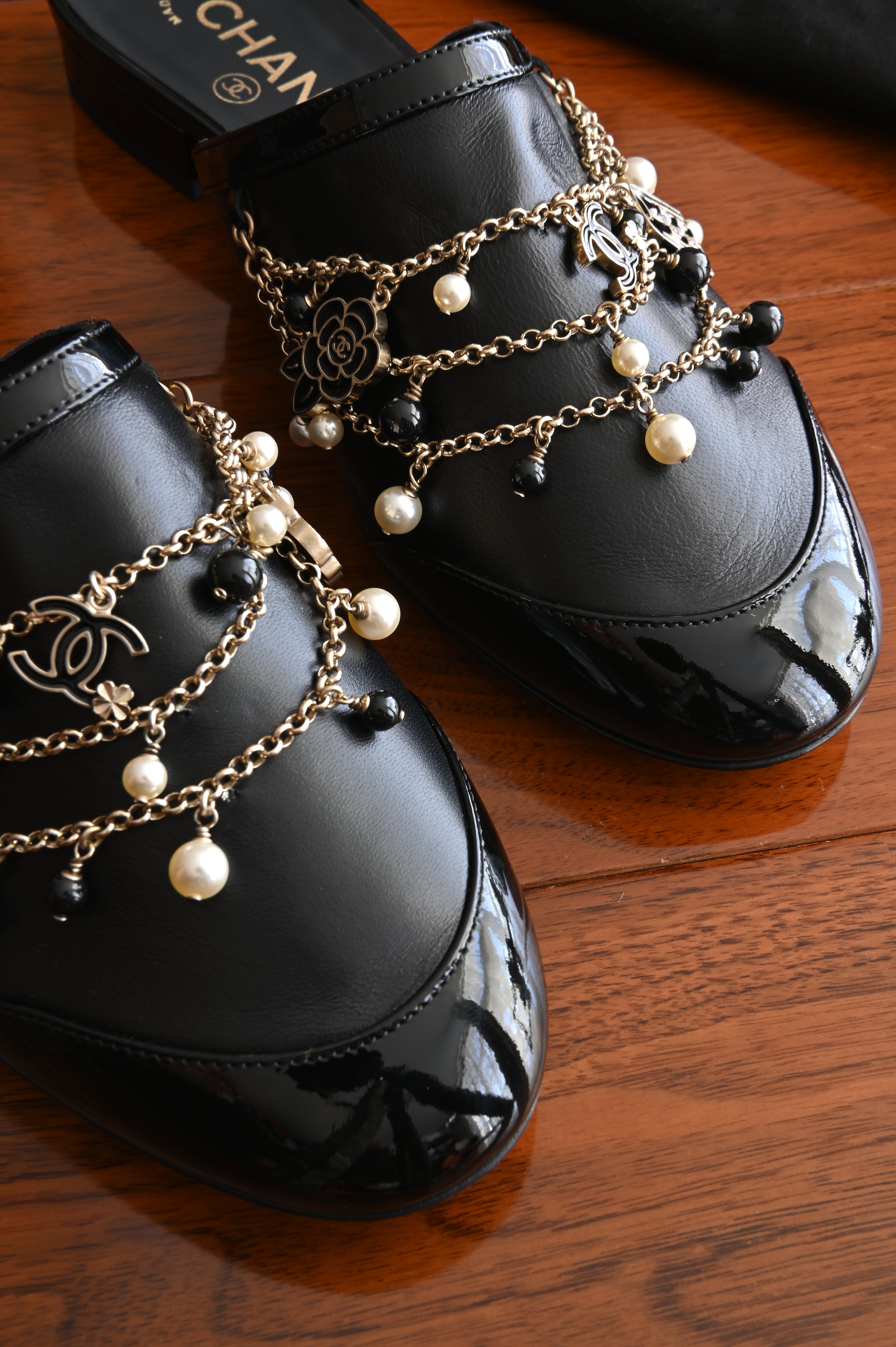 Chanel Pearl Charmed Chain Black Mules front two