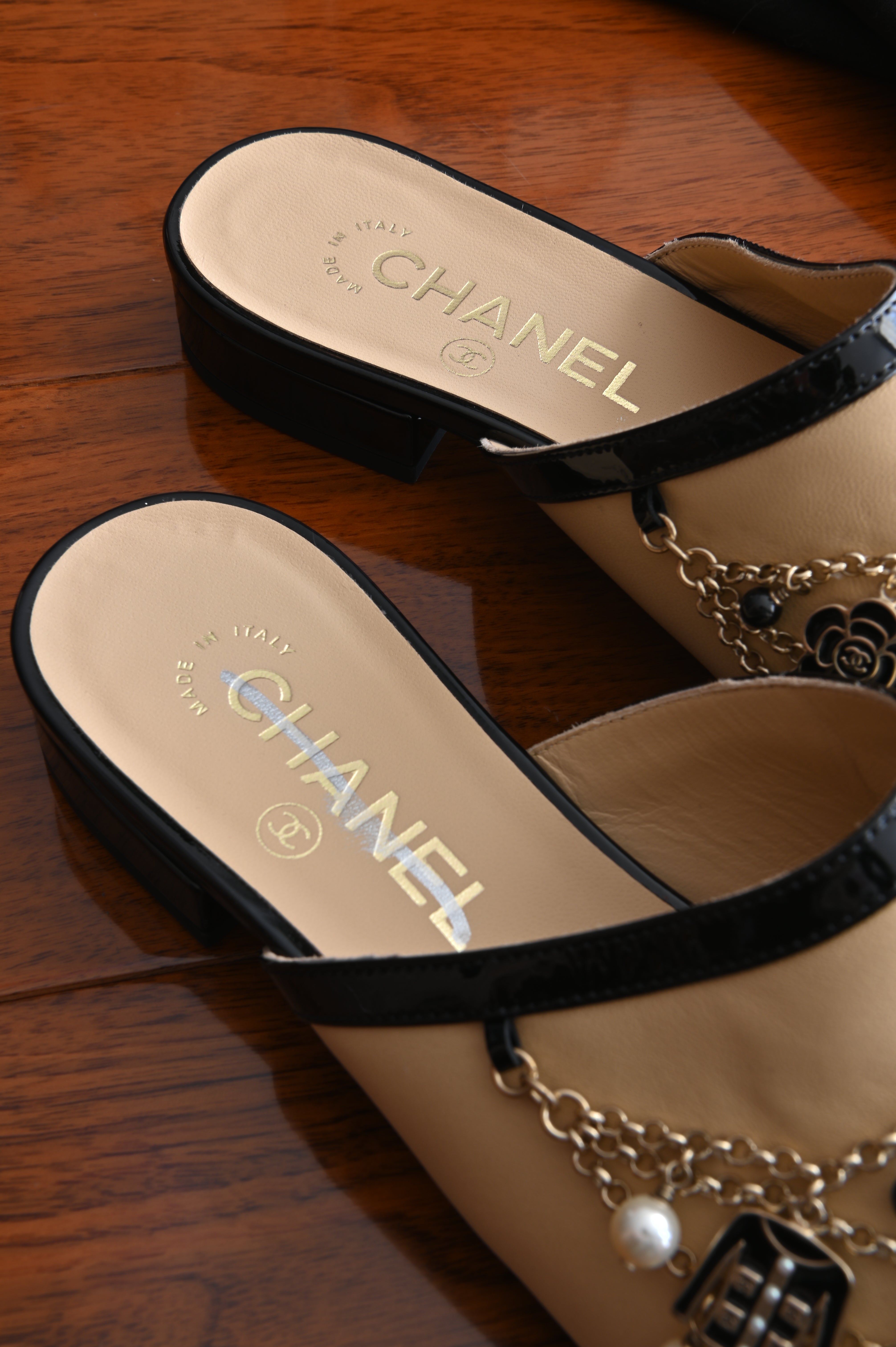 Chanel Pearl Charmed Chain Mules logo two