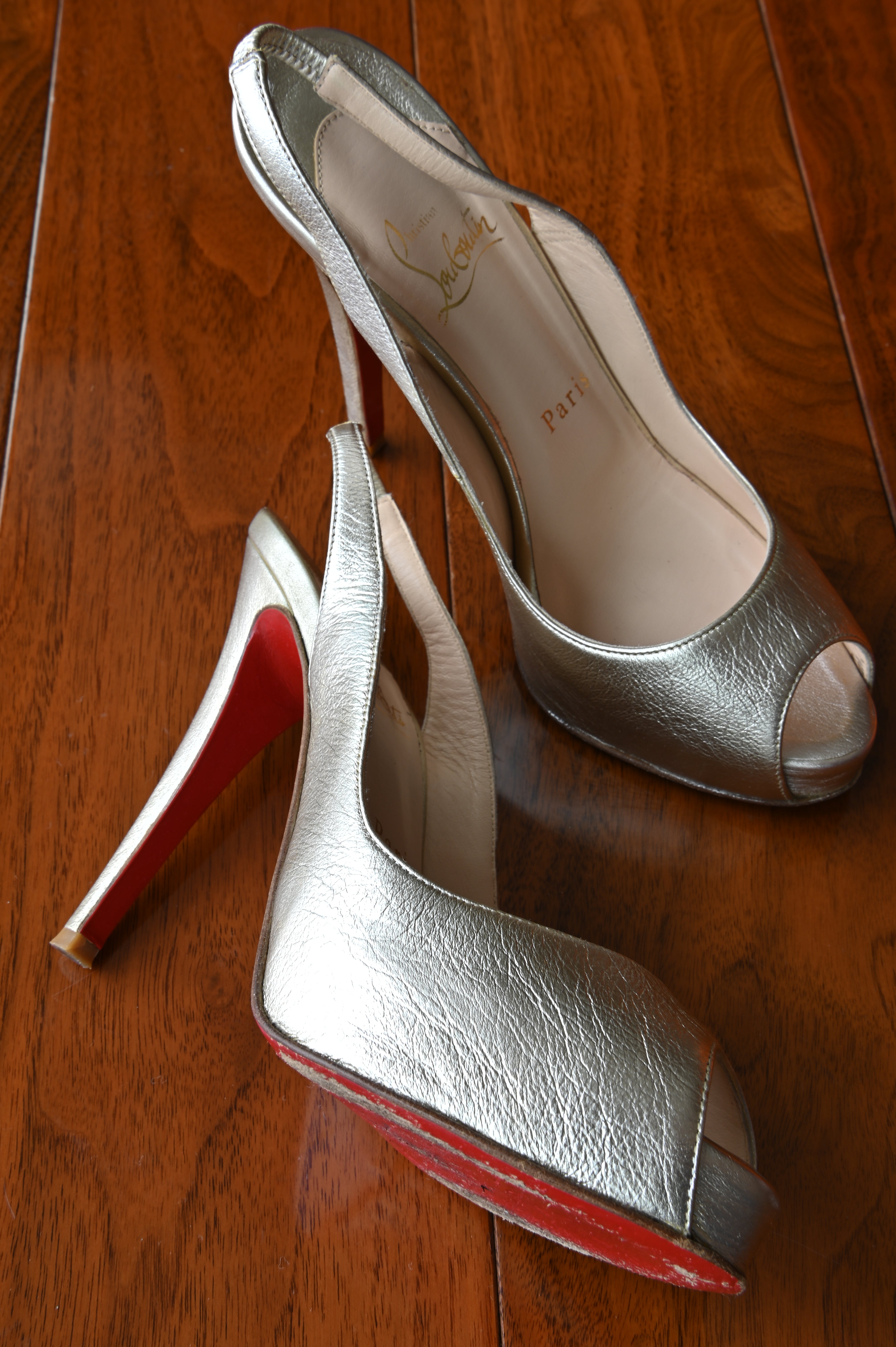 Christian Louboutin Silver Metallic Leather Slingback Pumps left