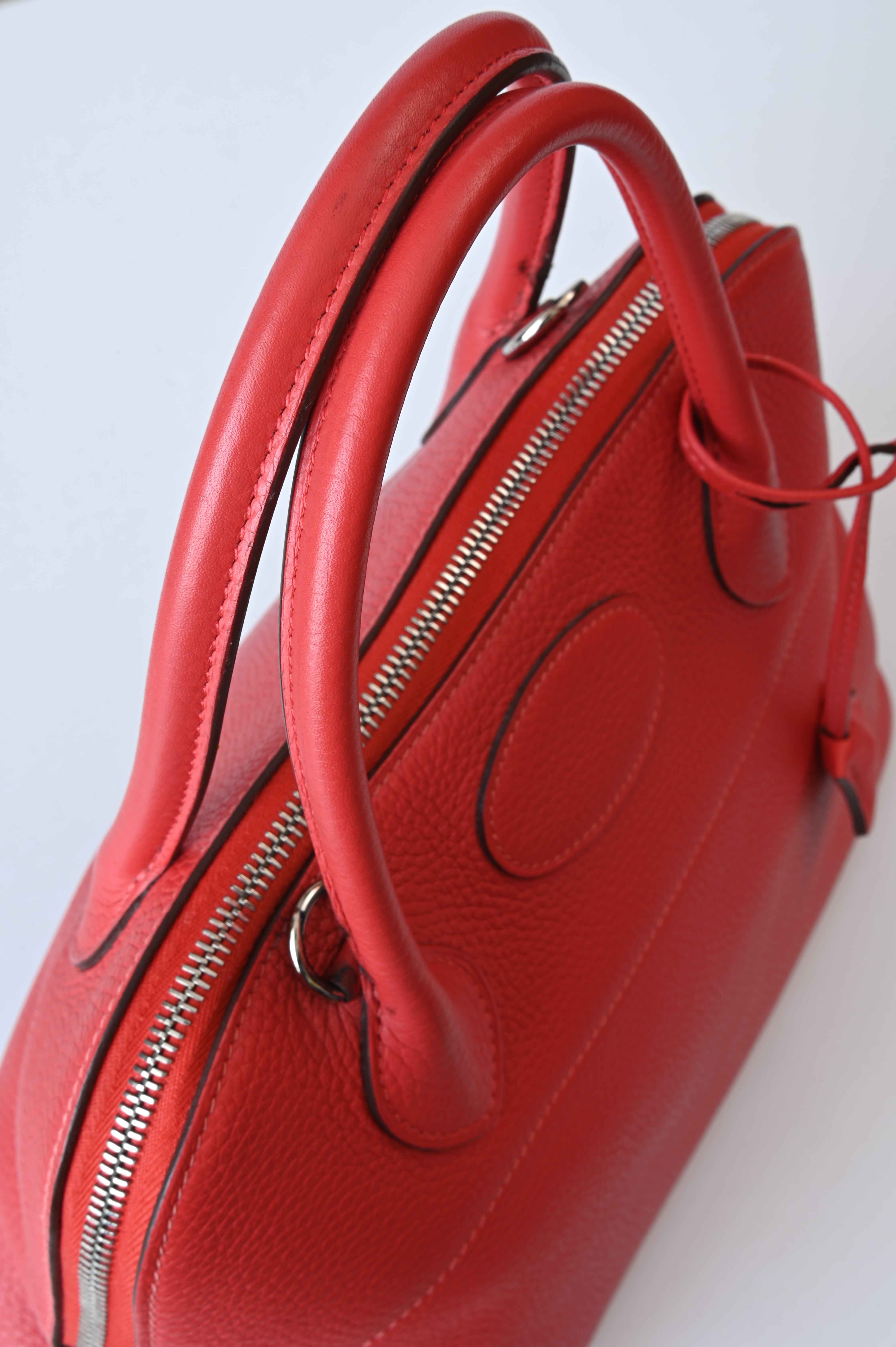 HERMÈS Bolide 31 handbag in Rouge Pivoine Clemence leather with Palladium hardware