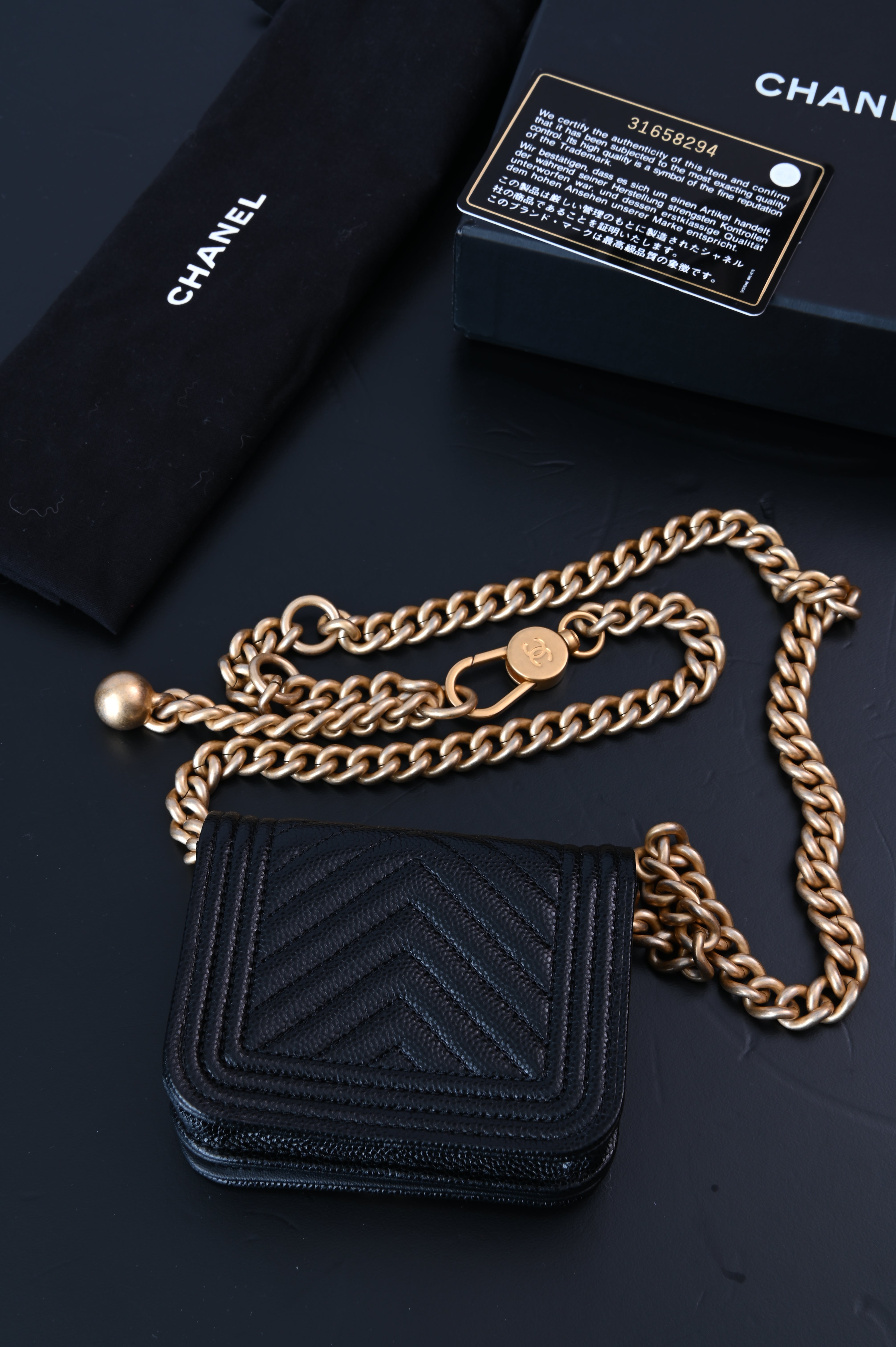 Chanel Boy flap belt bag in caviar leather and gold hardware