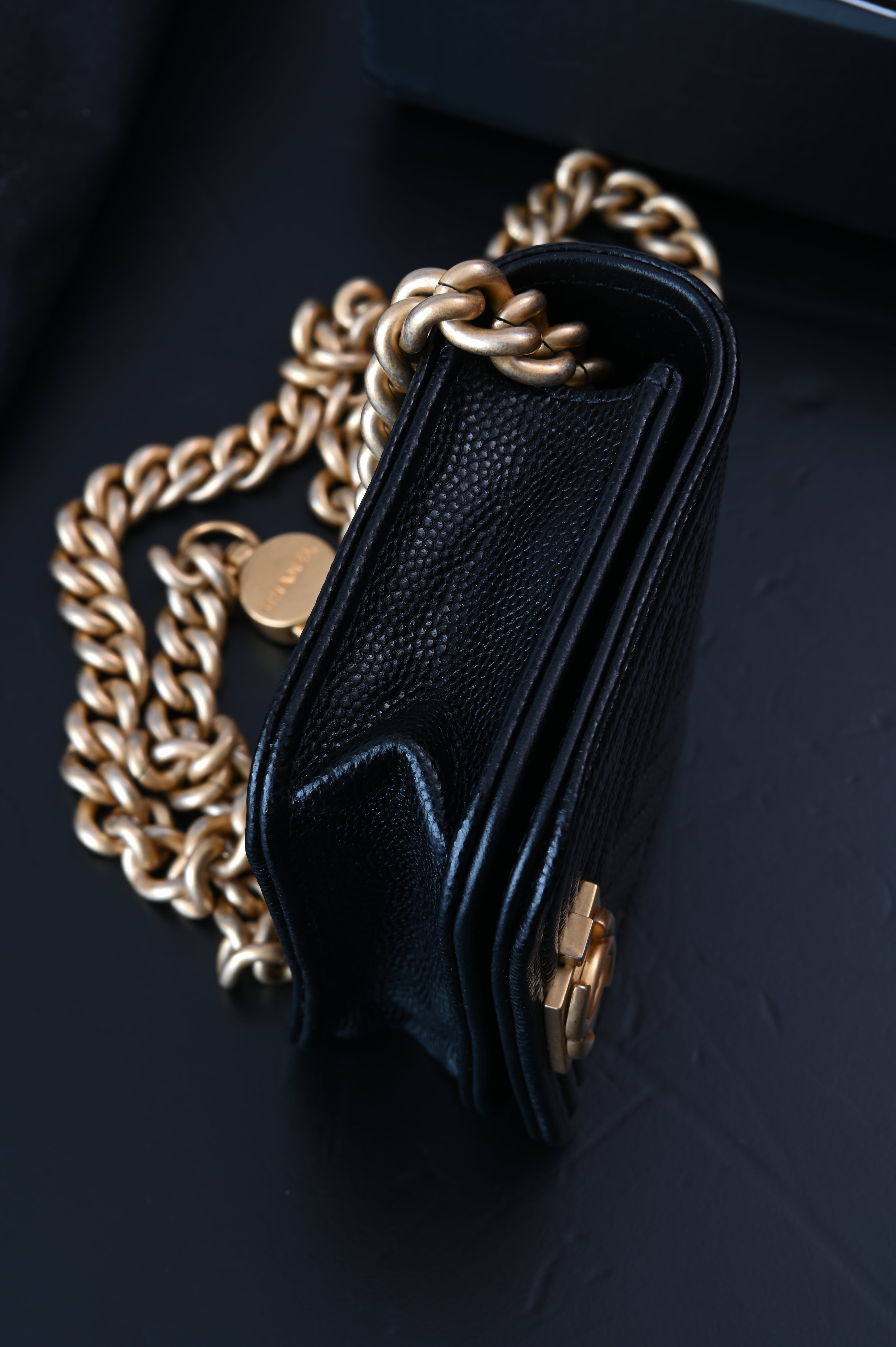 Chanel Boy flap belt bag in caviar leather and gold hardware