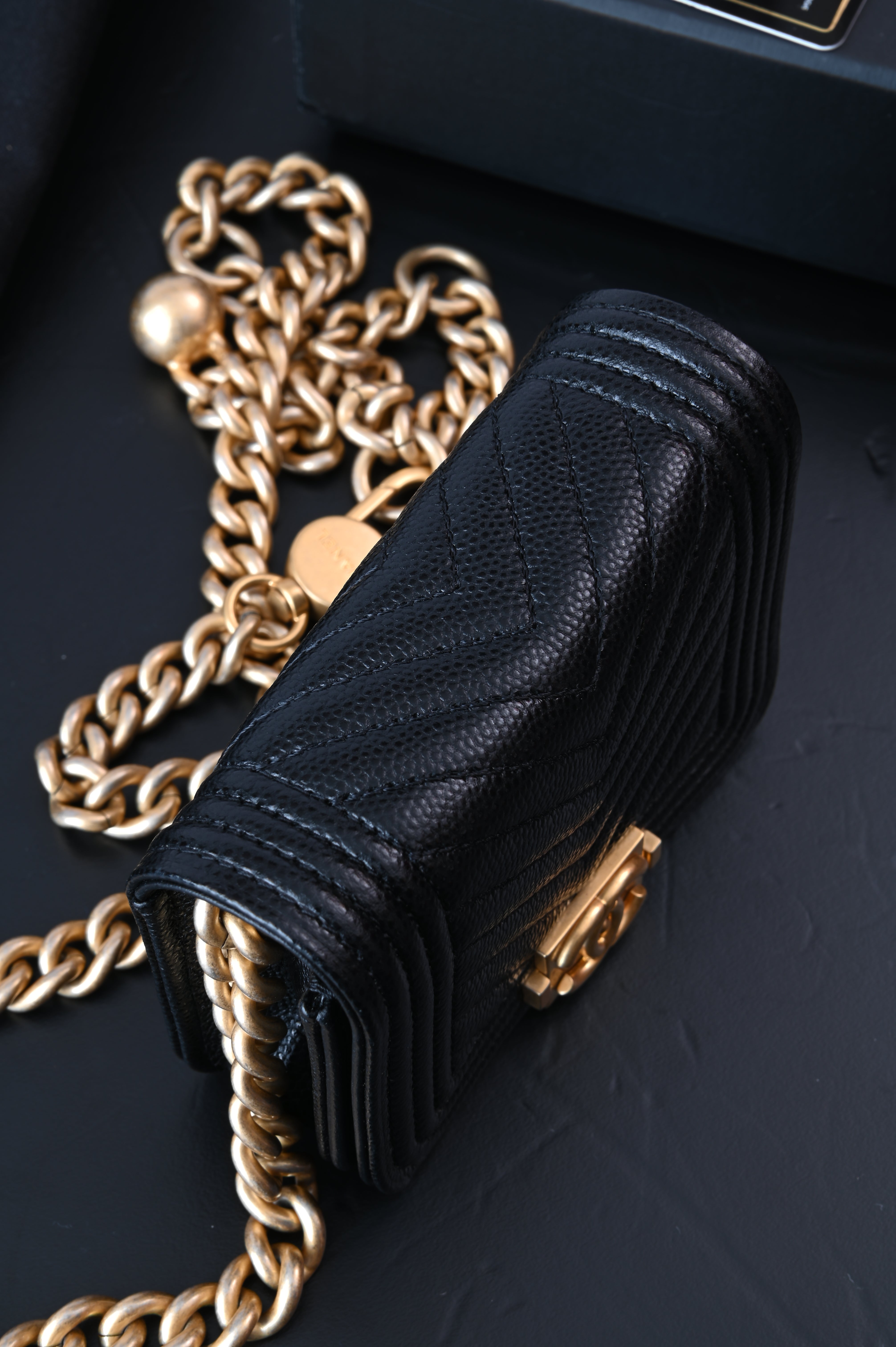 Chanel Boy flap belt bag in caviar leather and gold hardware