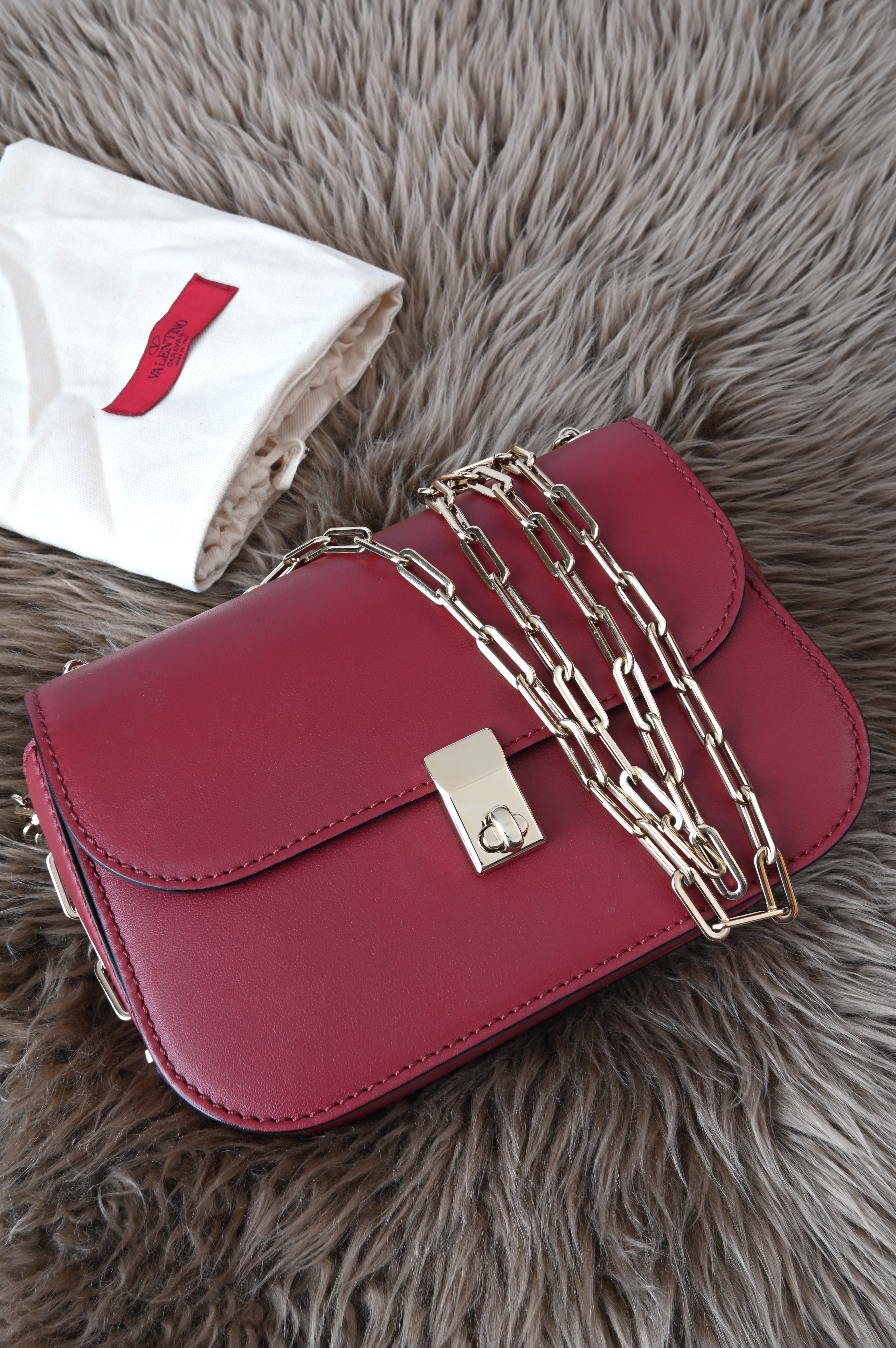 Valentino Garavani Burgundy flap chained bag
