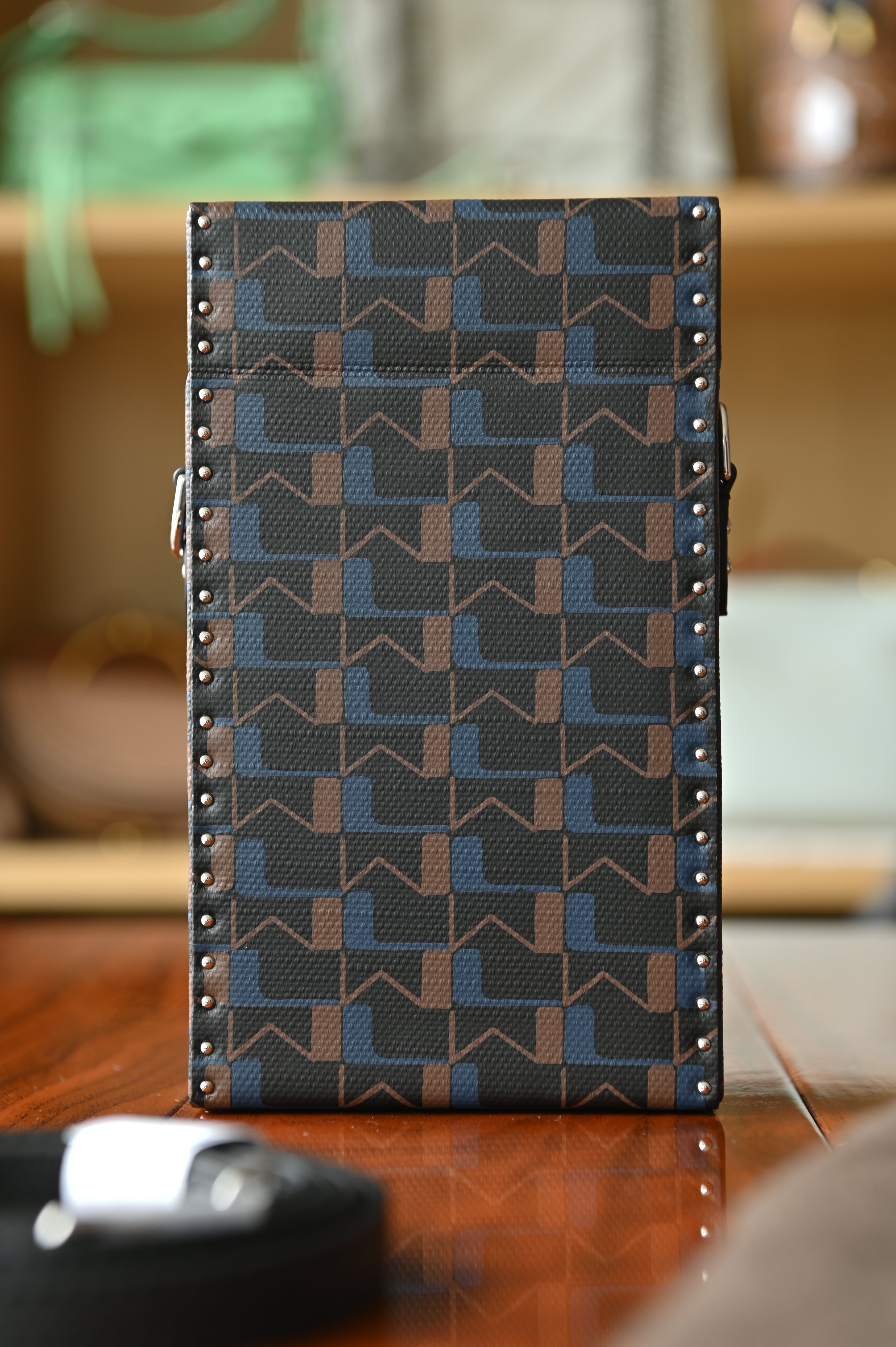 Moynat Patterned clutch bag with geometric design