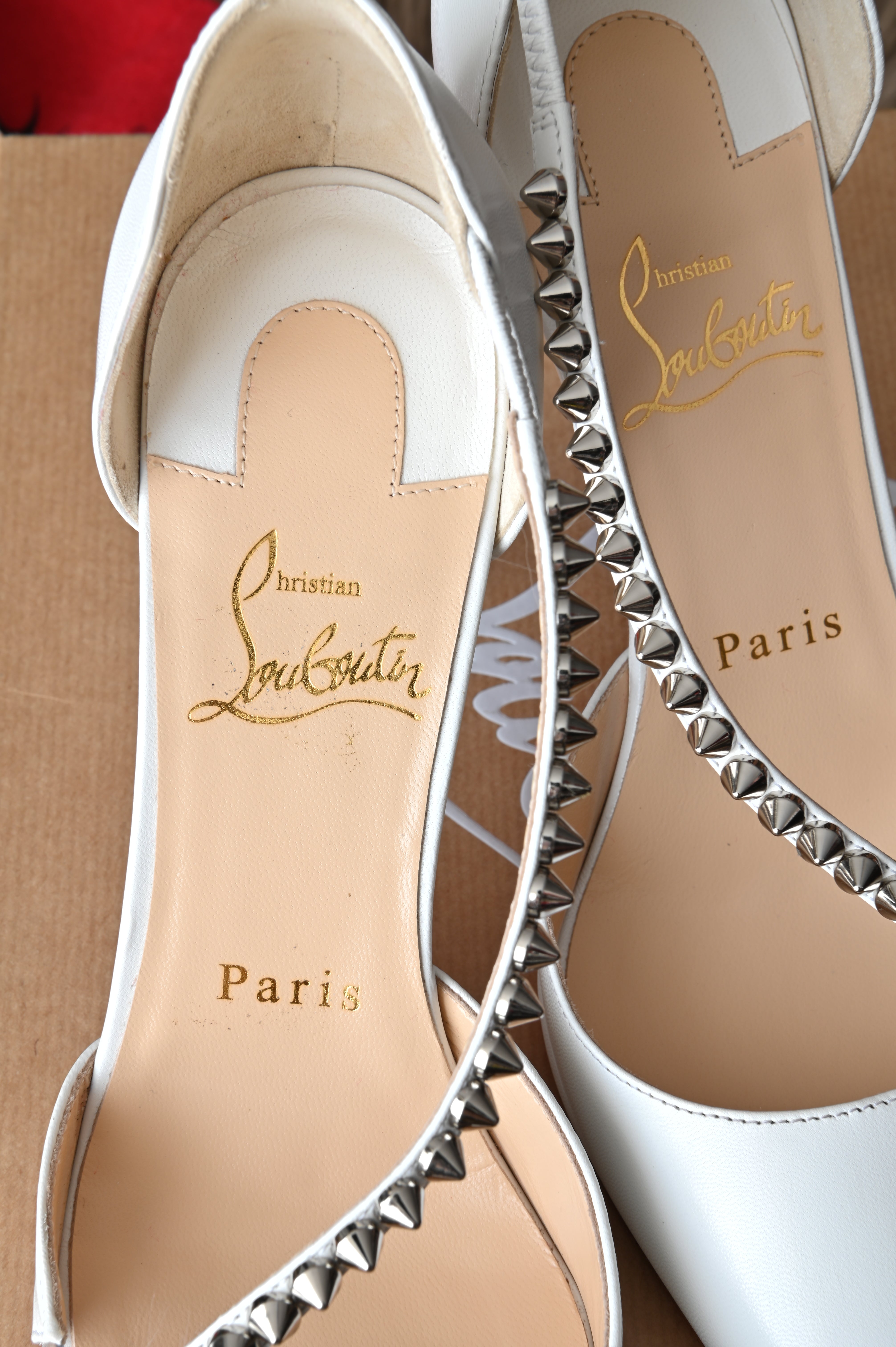 Christian Louboutin Kate Cross white stiletto with studs