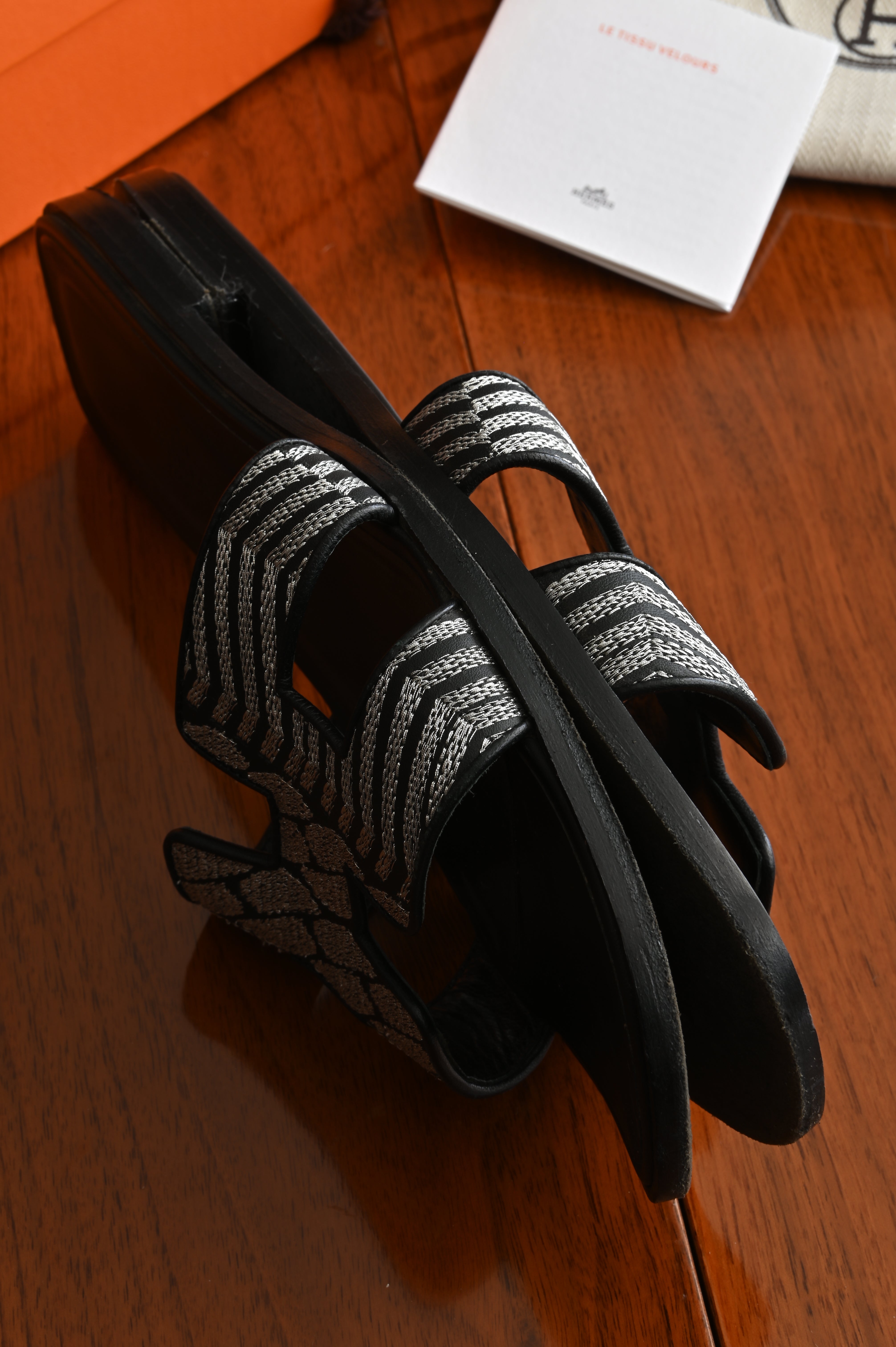 Hermès Oran in Black and Silver Embroidered Calf Sandals