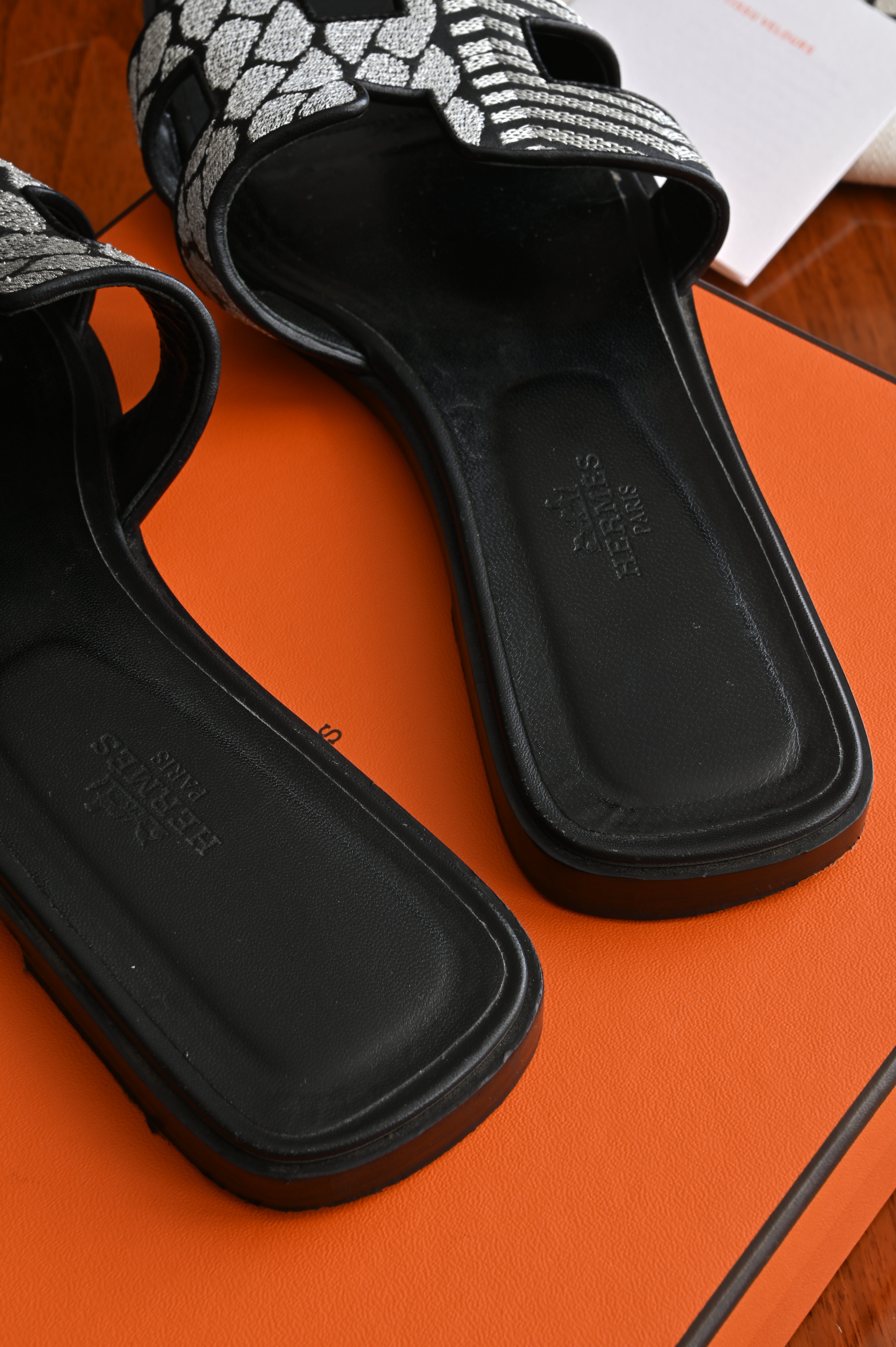 Hermès Oran in Black and Silver Embroidered Calf Sandals