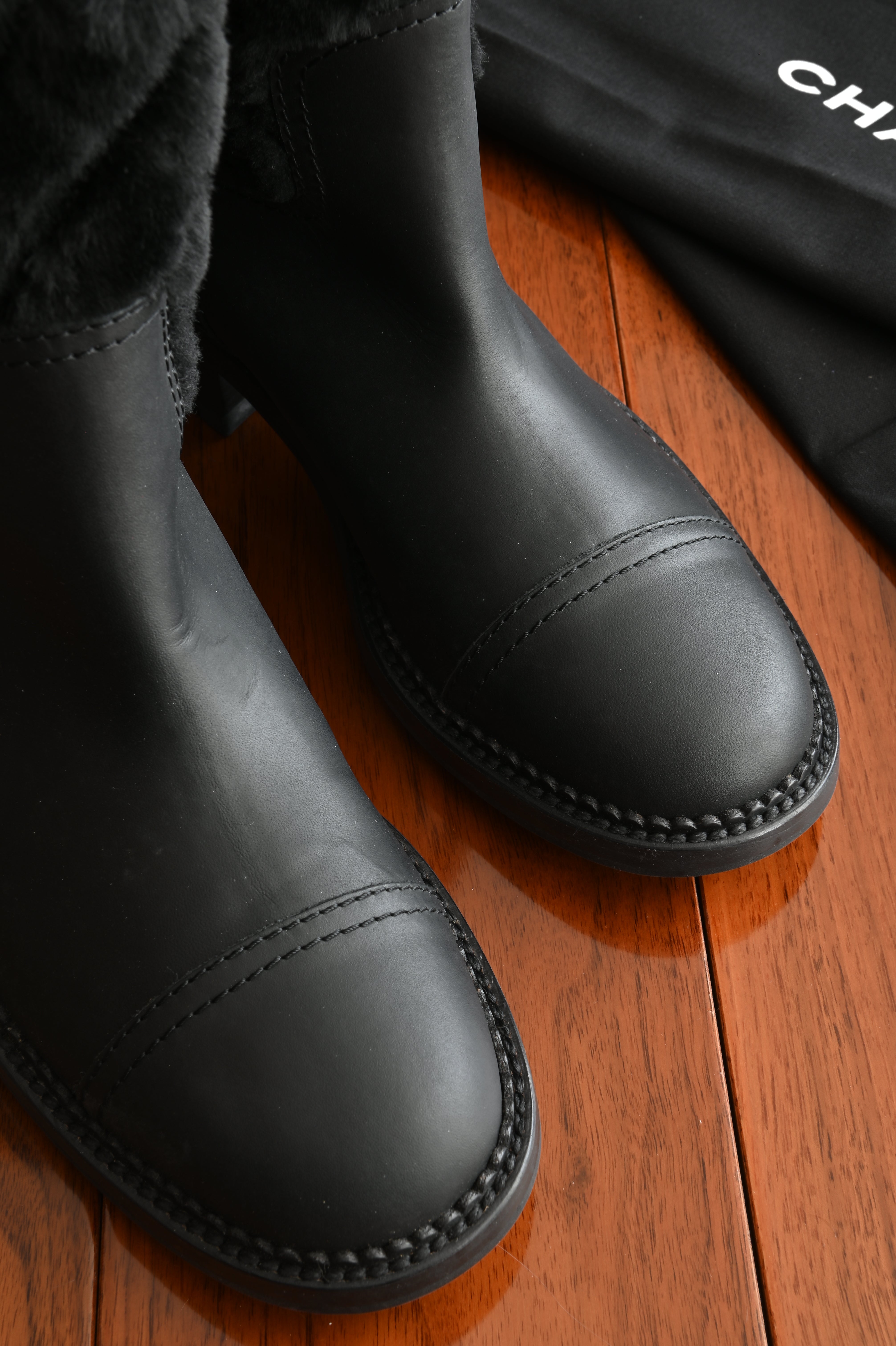 Chanel Black Leather Quilted Fur Boots