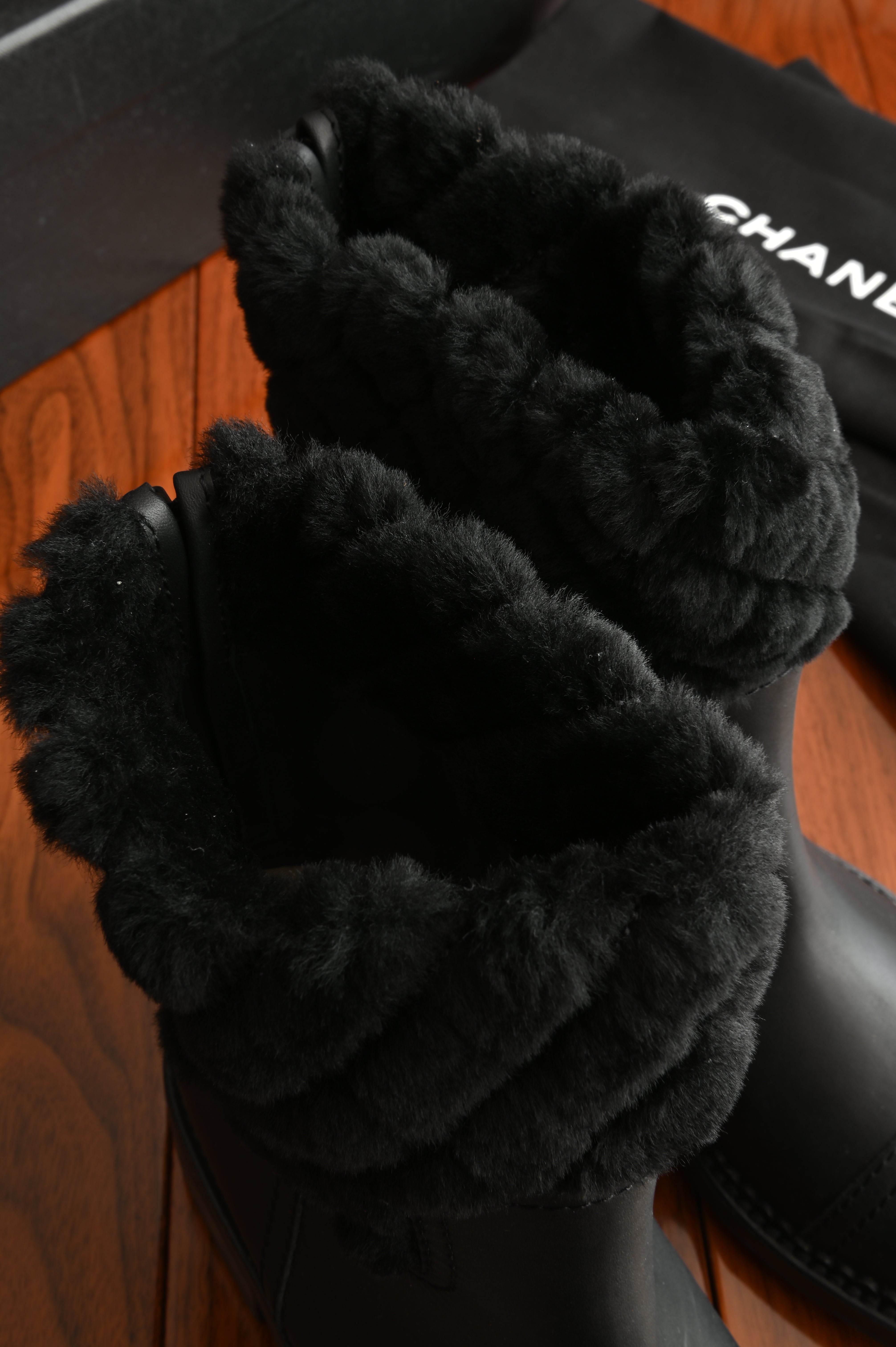 Chanel Black Leather Quilted Fur Boots