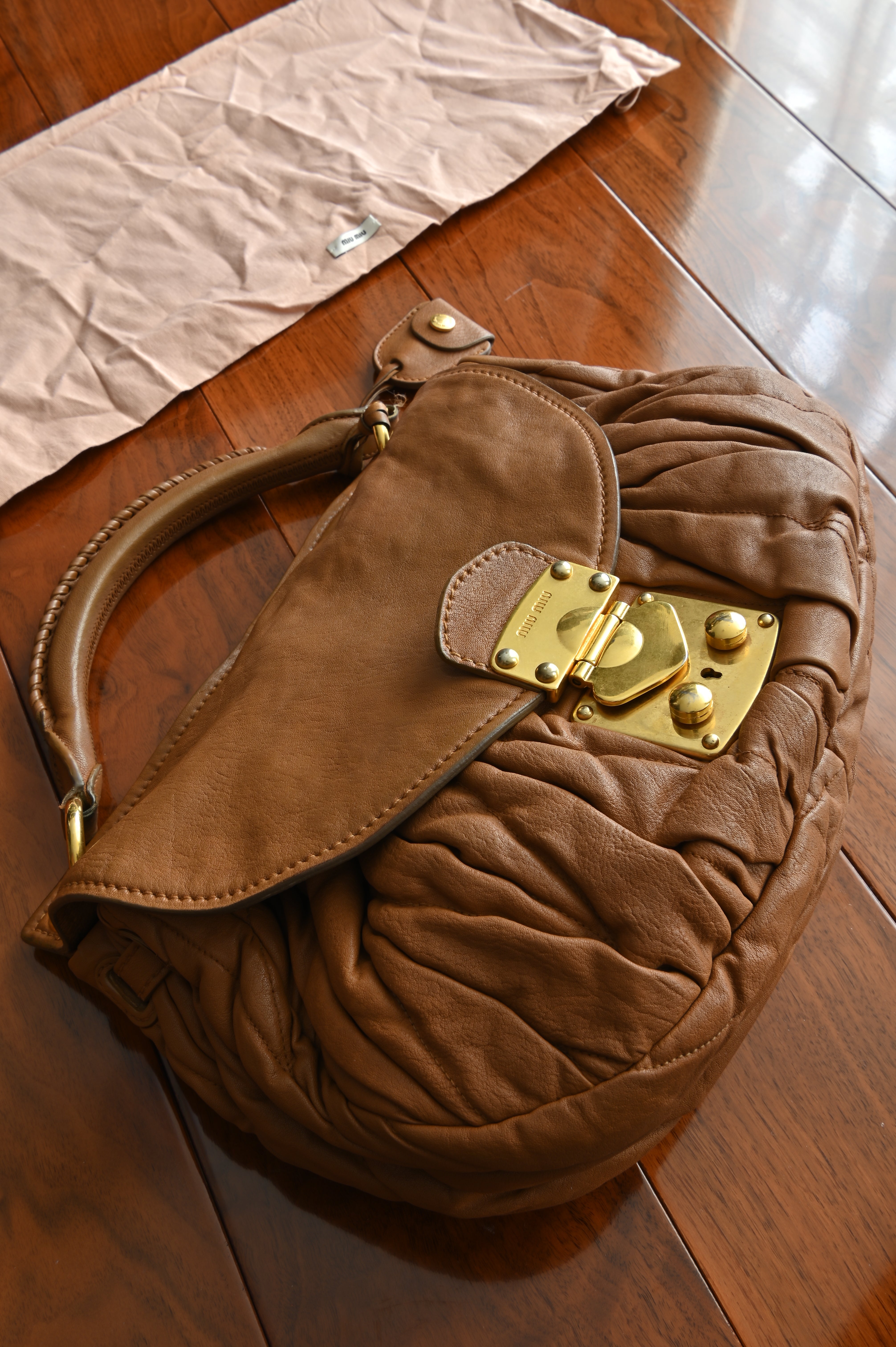Miu Miu Coffer Matelassé leather hobo bag in Tan