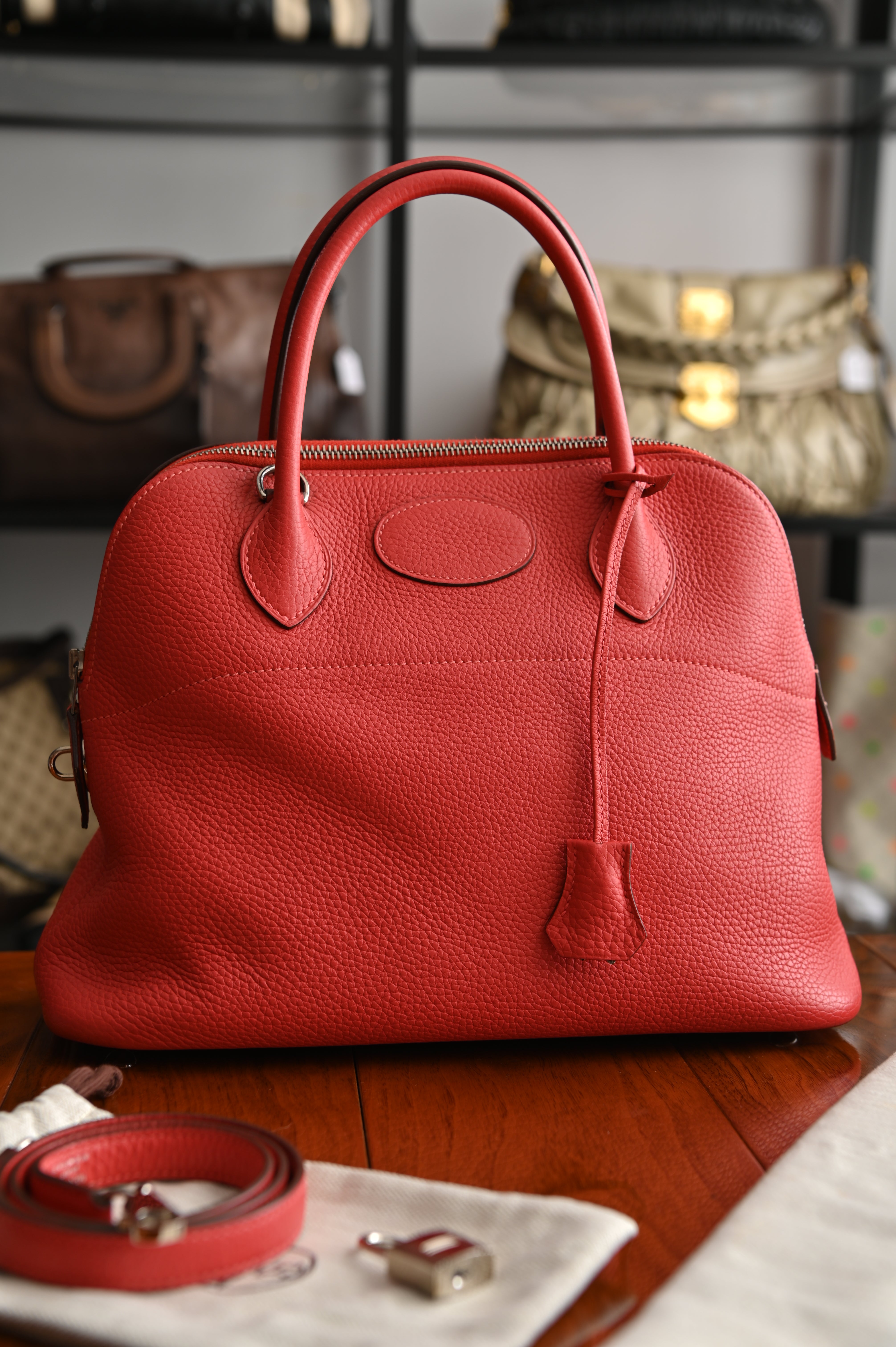 HERMÈS Bolide 31 handbag in Rouge Pivoine Clemence leather with Palladium hardware