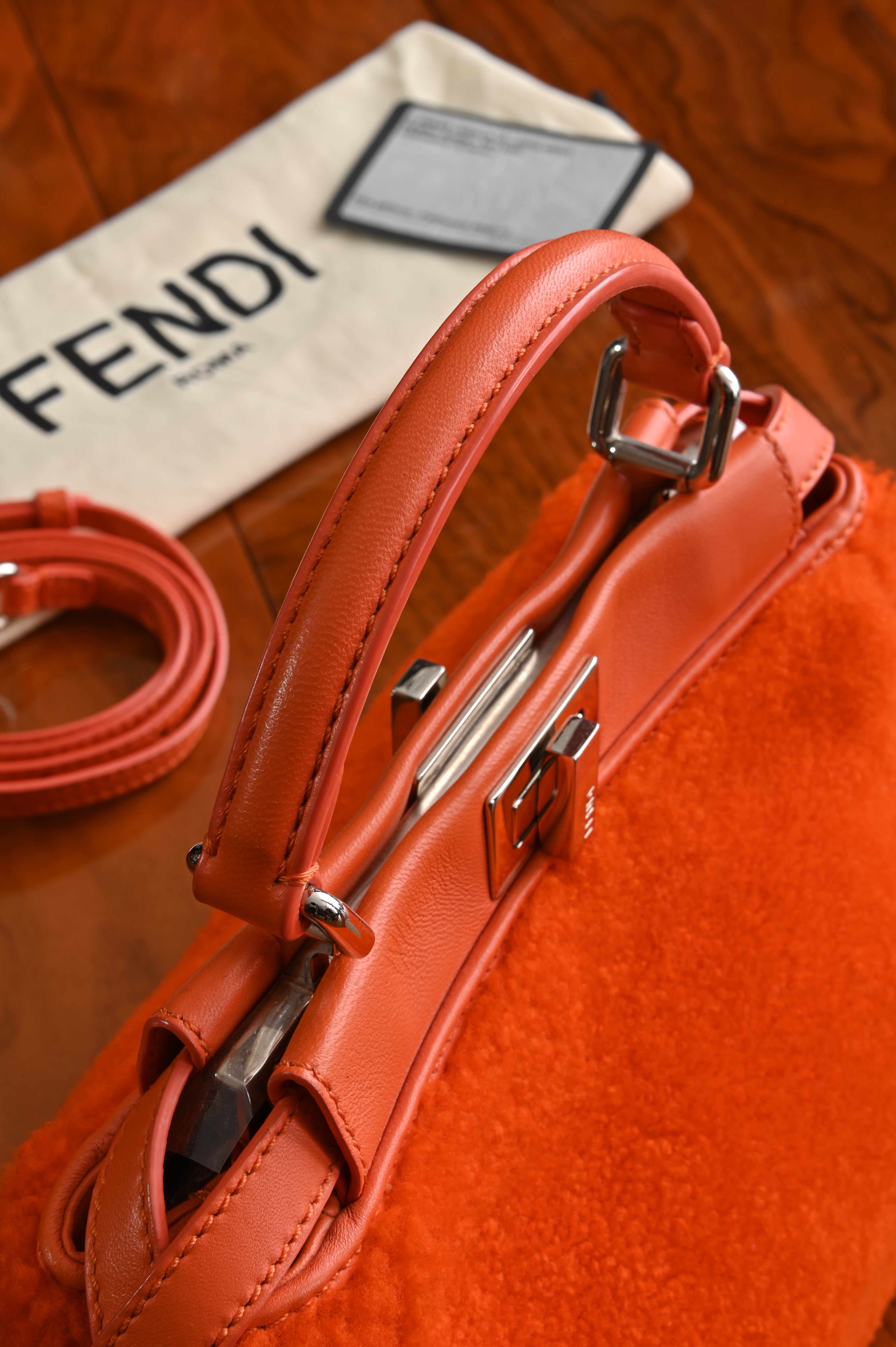 Fendi Mini Peekaboo orange shearling fur bag