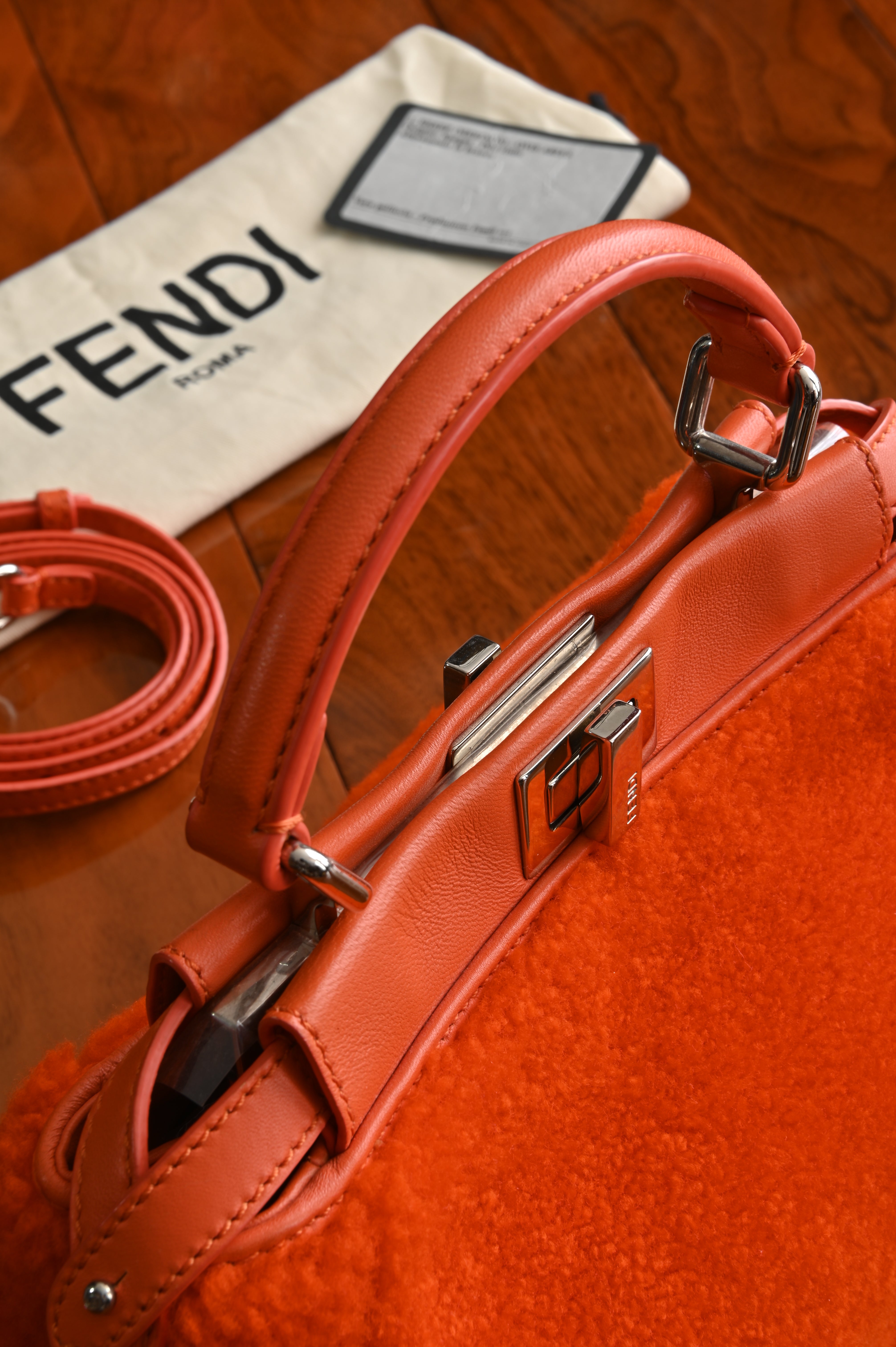 Fendi Mini Peekaboo orange shearling fur bag