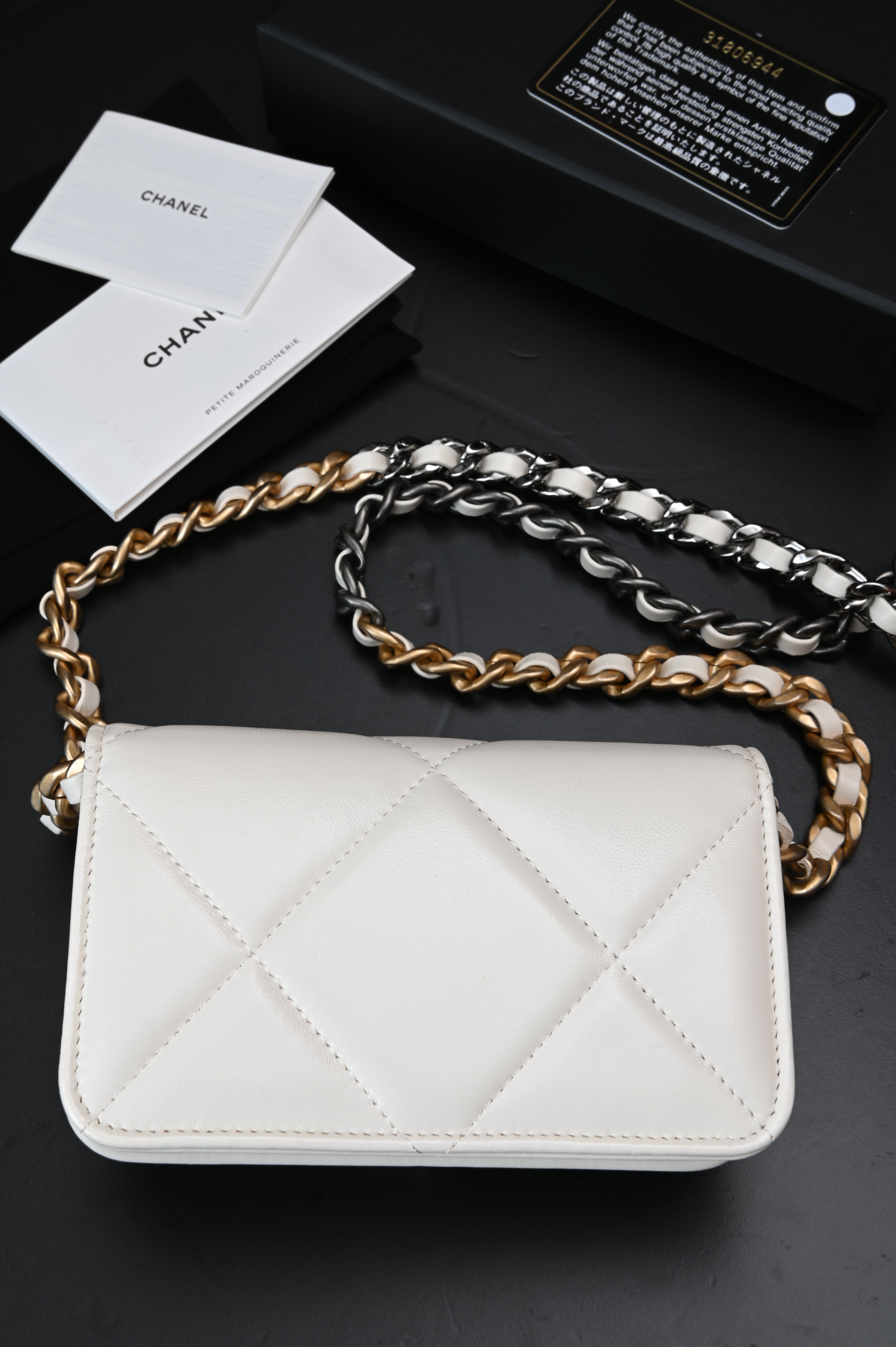 Chanel White Quilted Lambskin Chanel 19 Flap Clutch Gold and Ruthenium Hardware, 2021